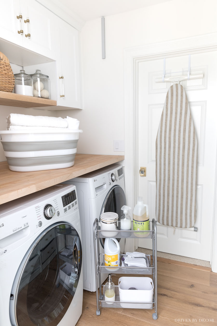 This rolling cart for between the washer and dryer is so smart! One of my favorite laundry room storage ideas!