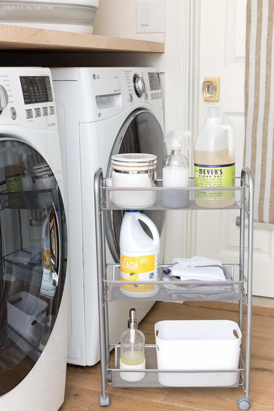 This slim rolling storage cart that goes between the washer and dryer for smart laundry room storage is everything!!