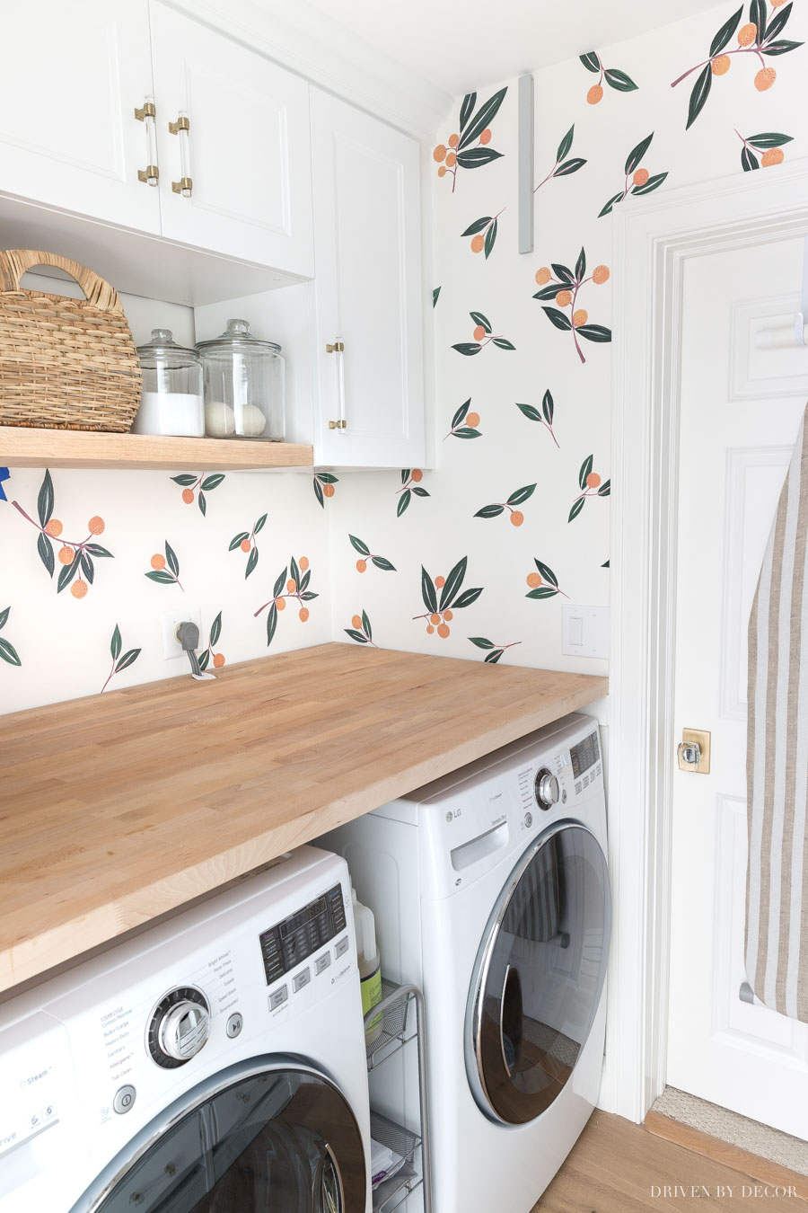 These vinyl wall decals are such a cute and easy way to dress up a space like this laundry room!