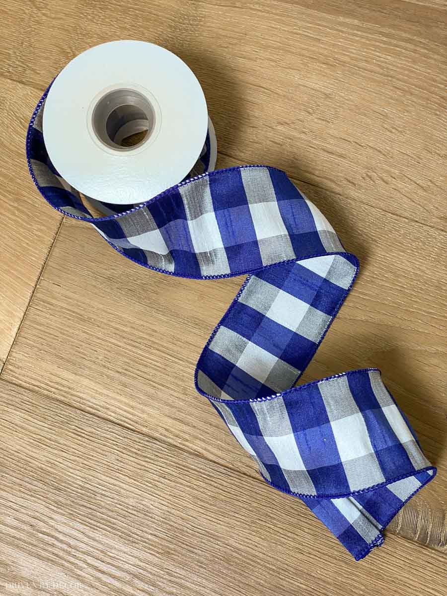 The cutest blue, white, and gray plaid wired ribbon to use on our Christmas tree!