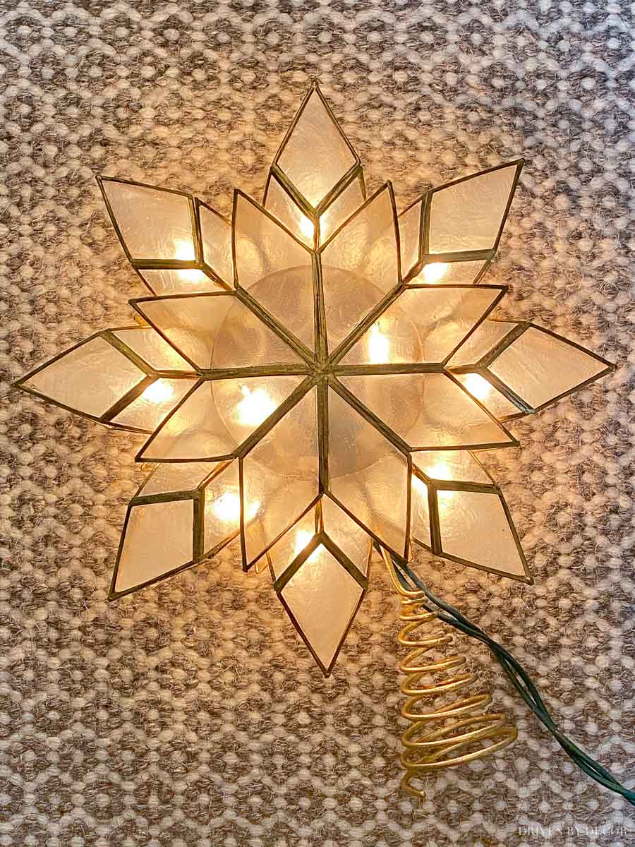 Love this gorgeous capiz star tree topper that lights up!