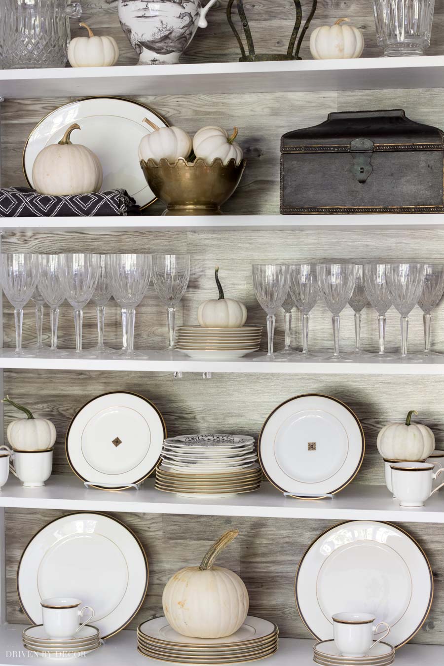 So cute! Baby boo pumpkins dress up this china cabinet for fall!