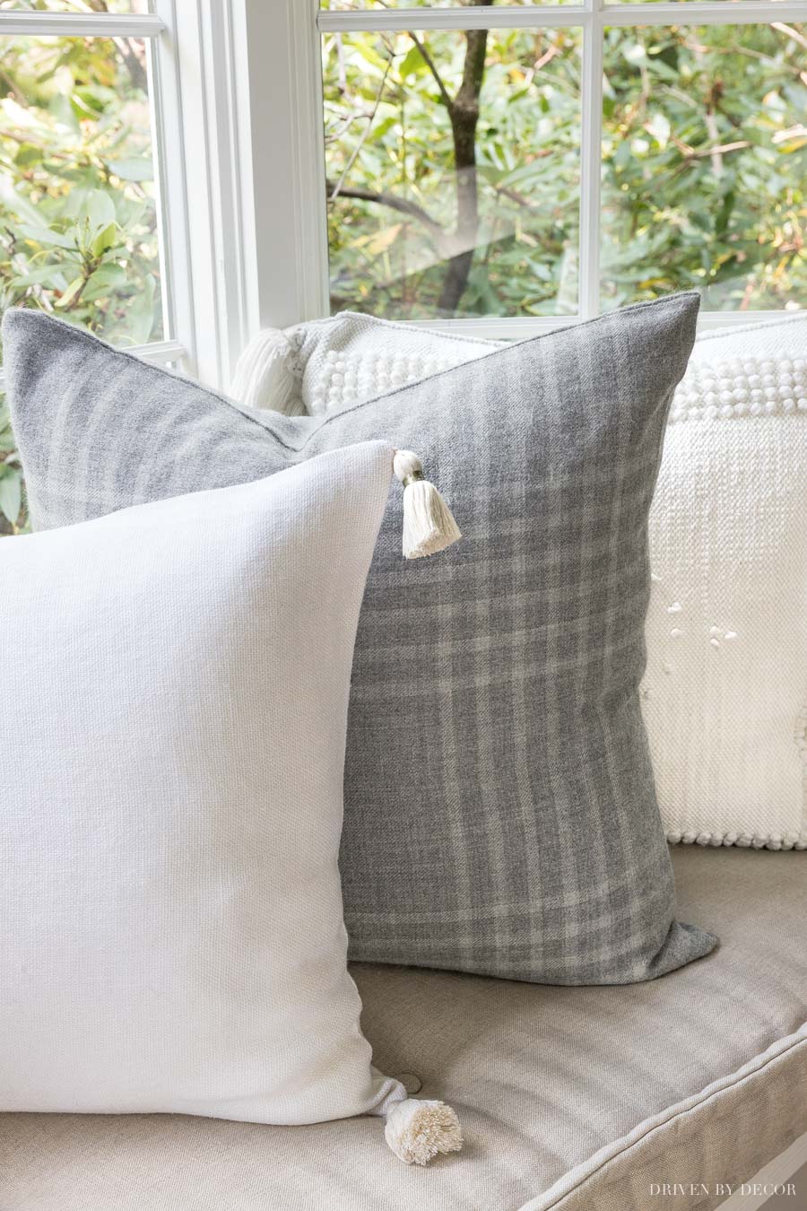 So obsessed in with gorgeous pillows!! The cream tassel end pillows go with everything!!
