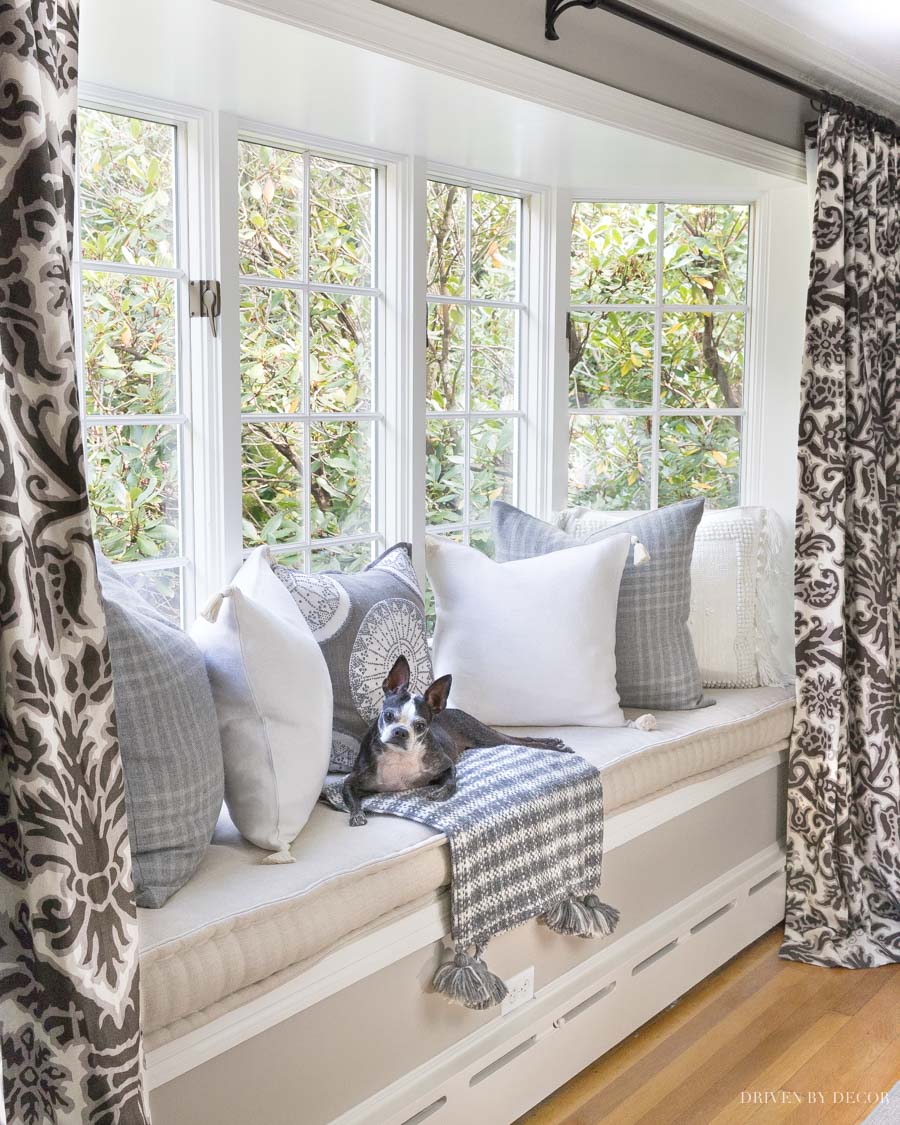 Loving these fall pillows and throw - such a dreamy window seat!