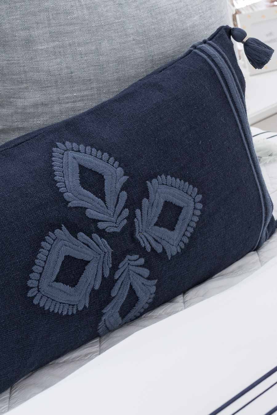 Gorgeous embroidered navy pillow - perfect for the front pillow on a bed!