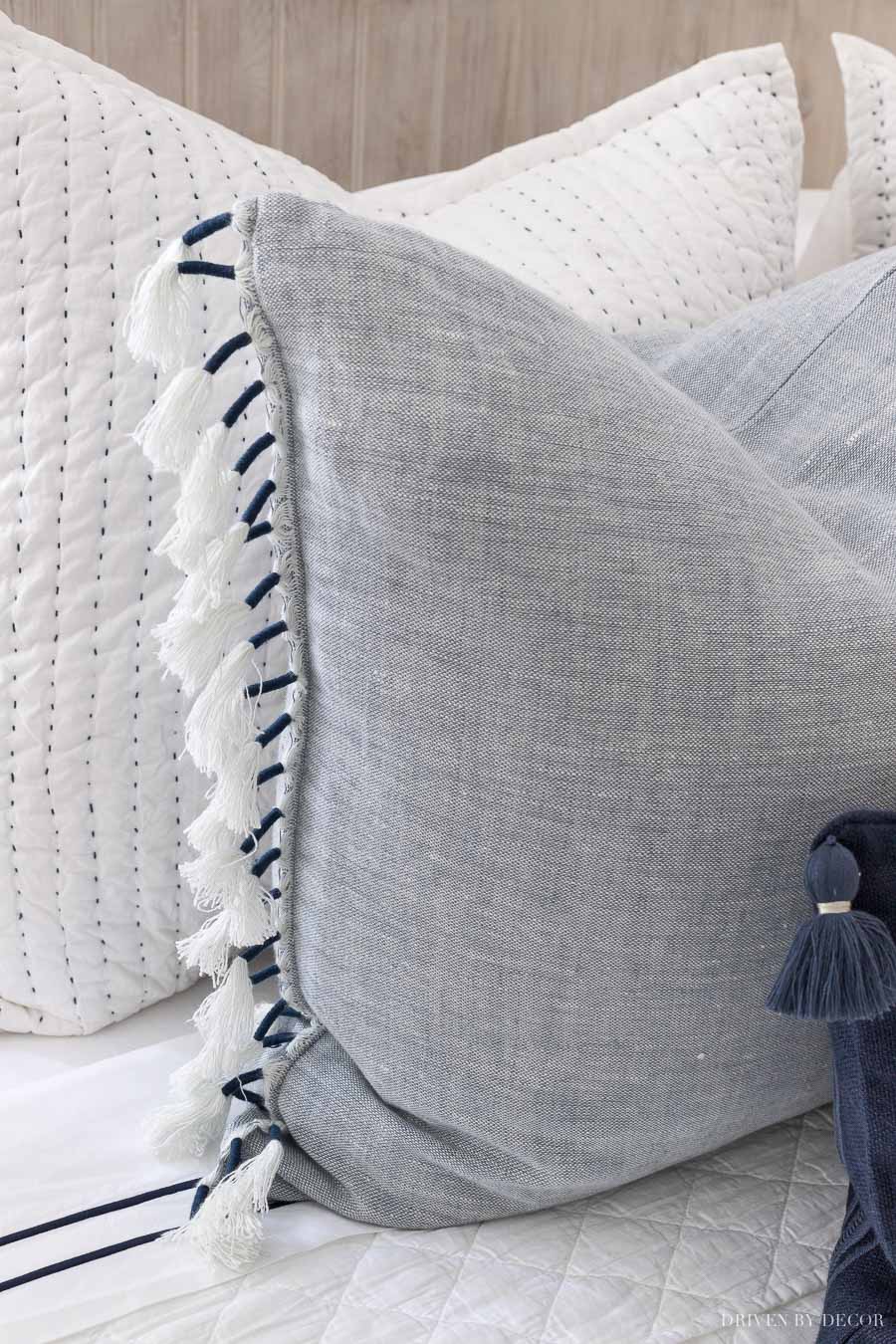 Love the tasseled edges of these blue pillows!