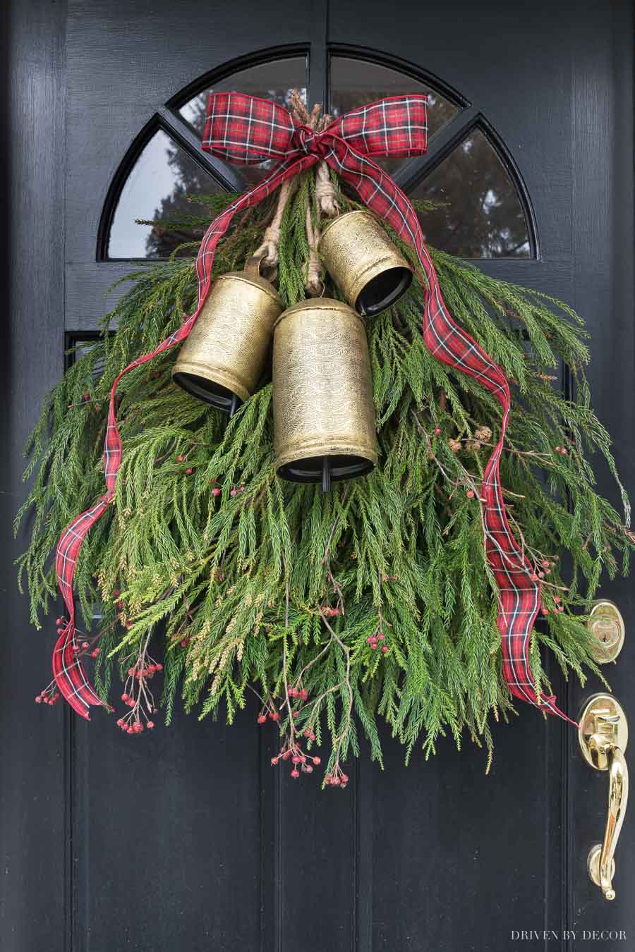 Gorgeous holiday greenery swag with a trio of brass bells and ribbon!