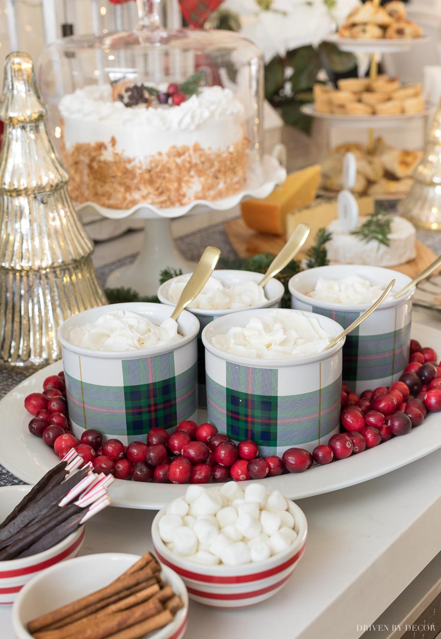 Cranberries add a pretty pop of red to this kitchen island holiday buffet!