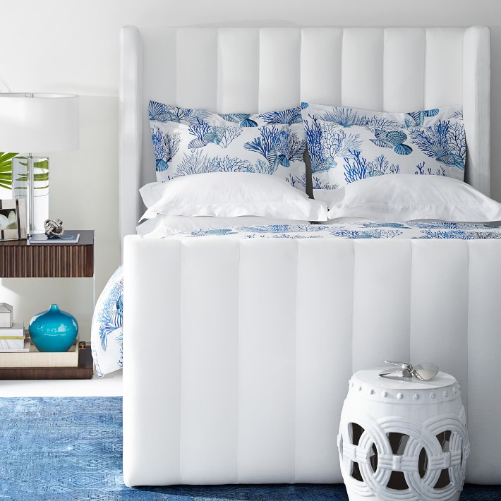 Gorgeous channeled headboard and footboard - definitely a trending bed design for 2020!