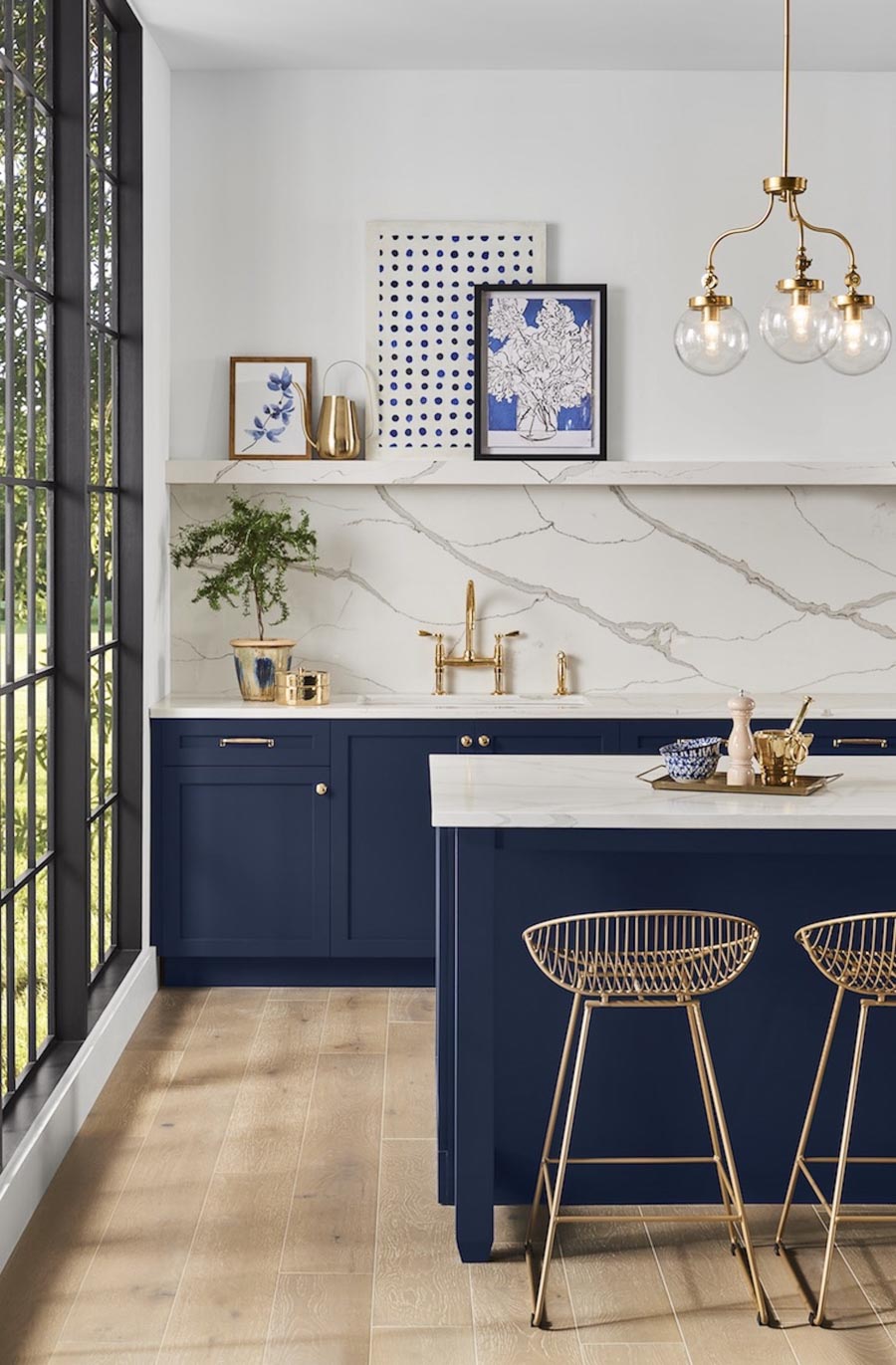 Love this kitchen cabinet color - deep blues are definitely a trending color!