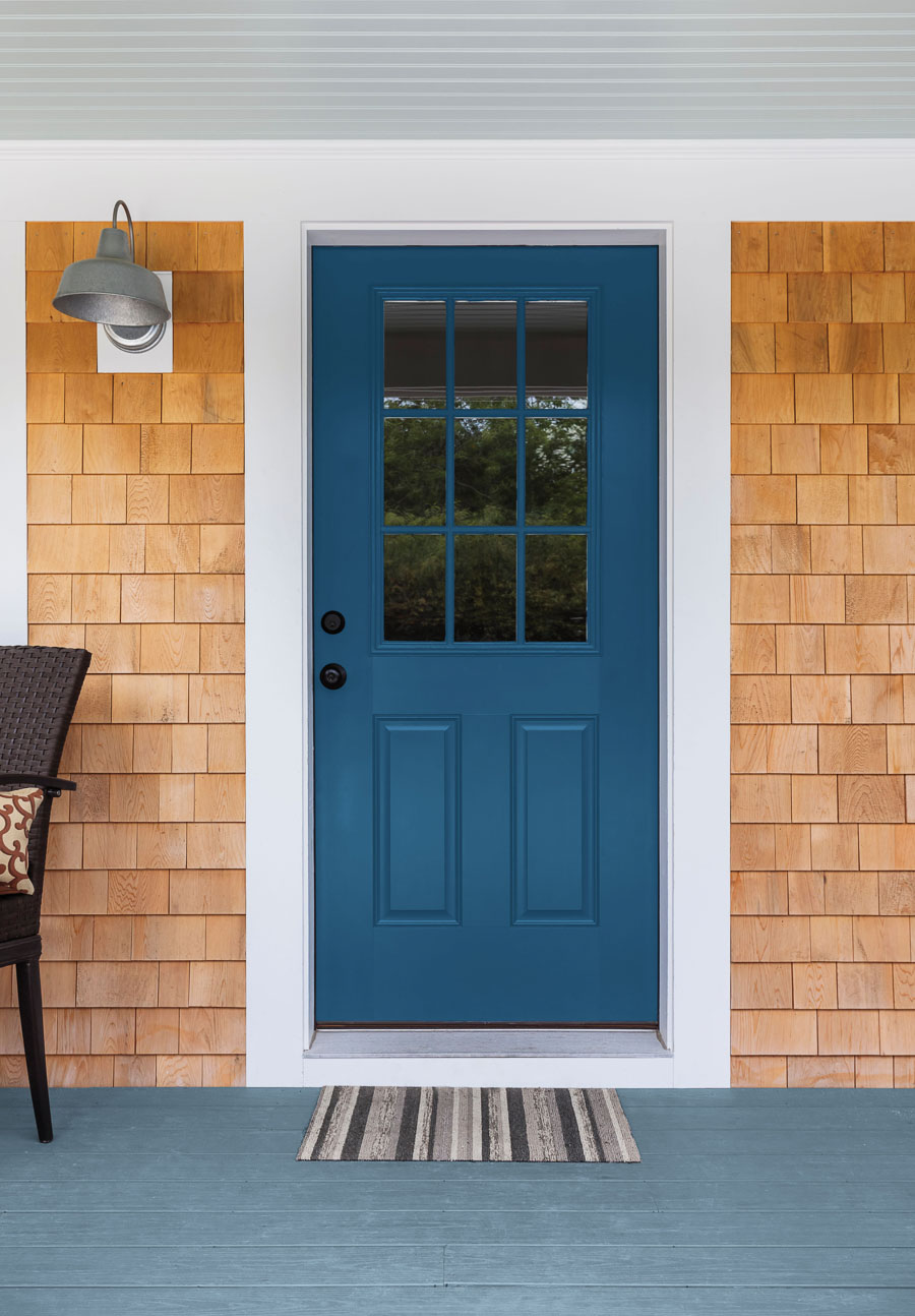 Love this shade of blue for a front door! More details on colors of the year are in this post!