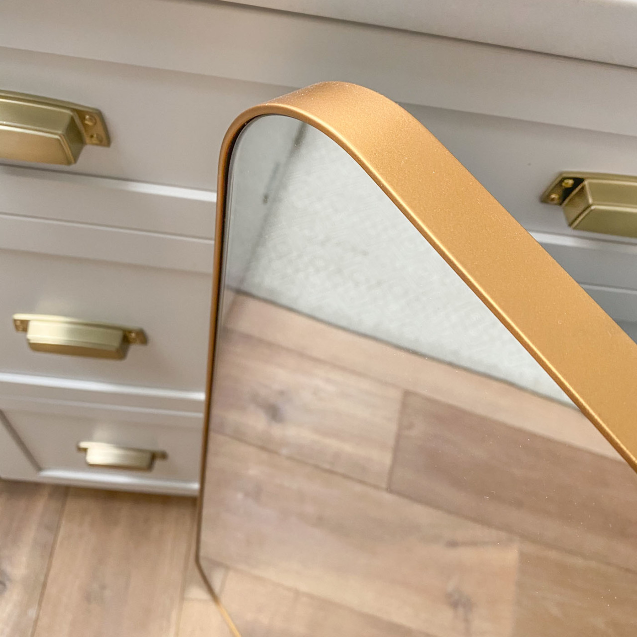 Beautiful gold bathroom mirrors!