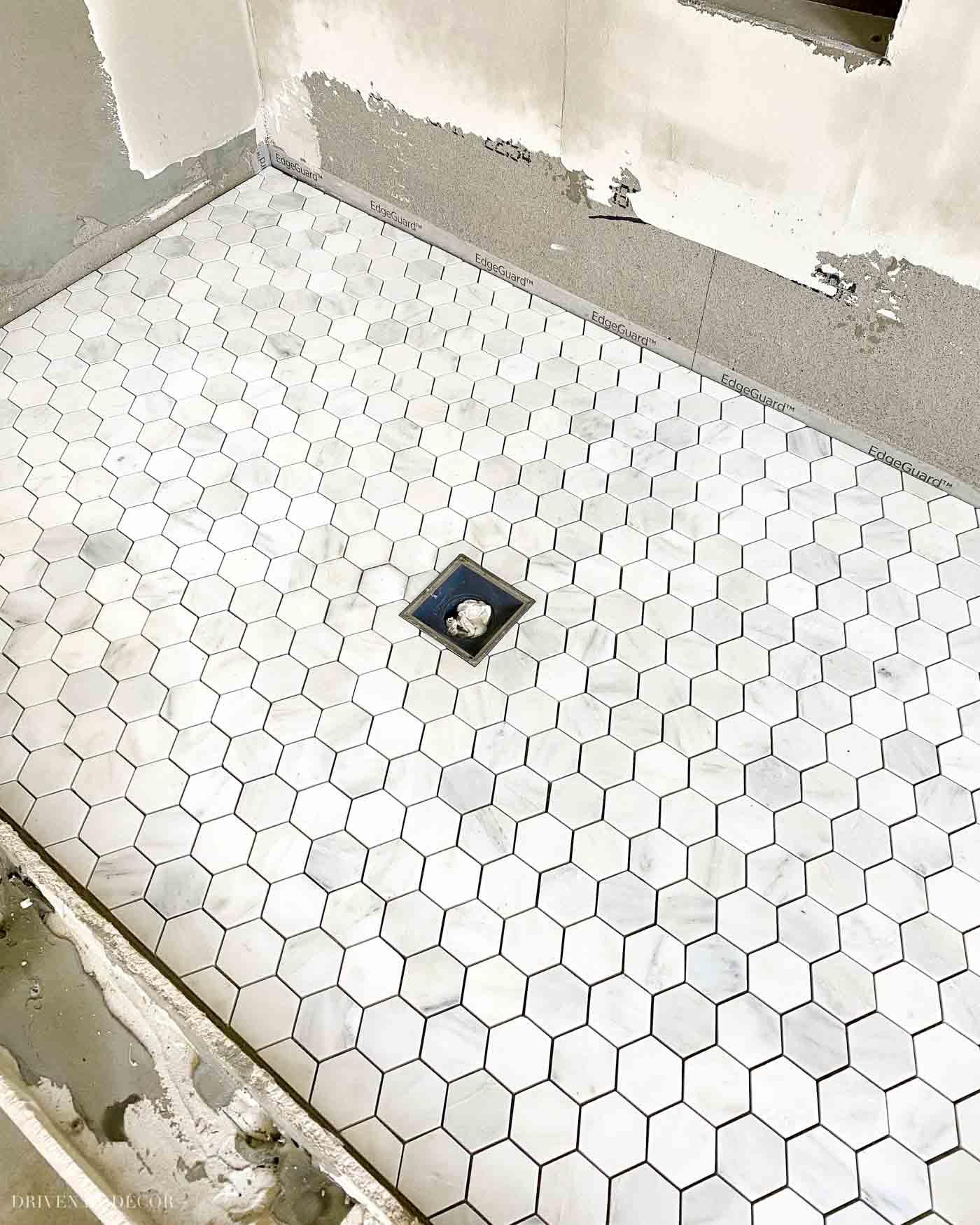 Gorgeous hexagon marble shower floor tile!!