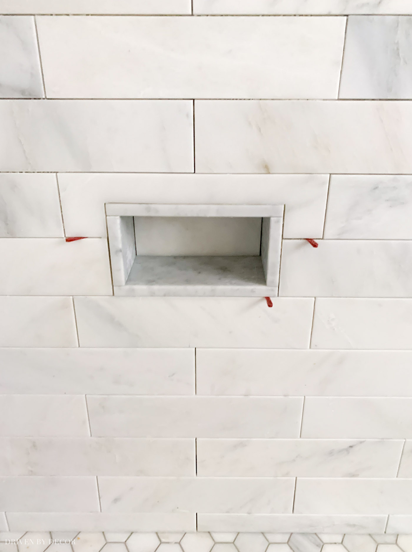 Love the idea of a foot rest niche like this for shaving in the shower!