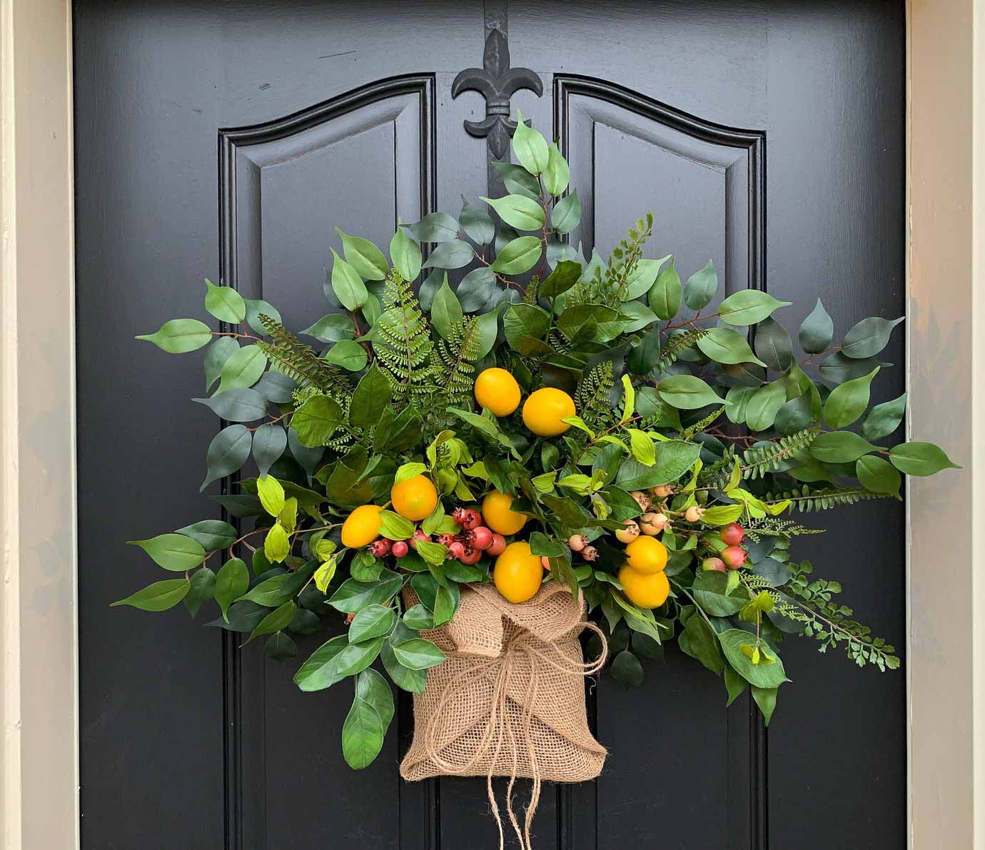 Love this spring "wreath" that looks like a colorful burlap wrapped bouquet!