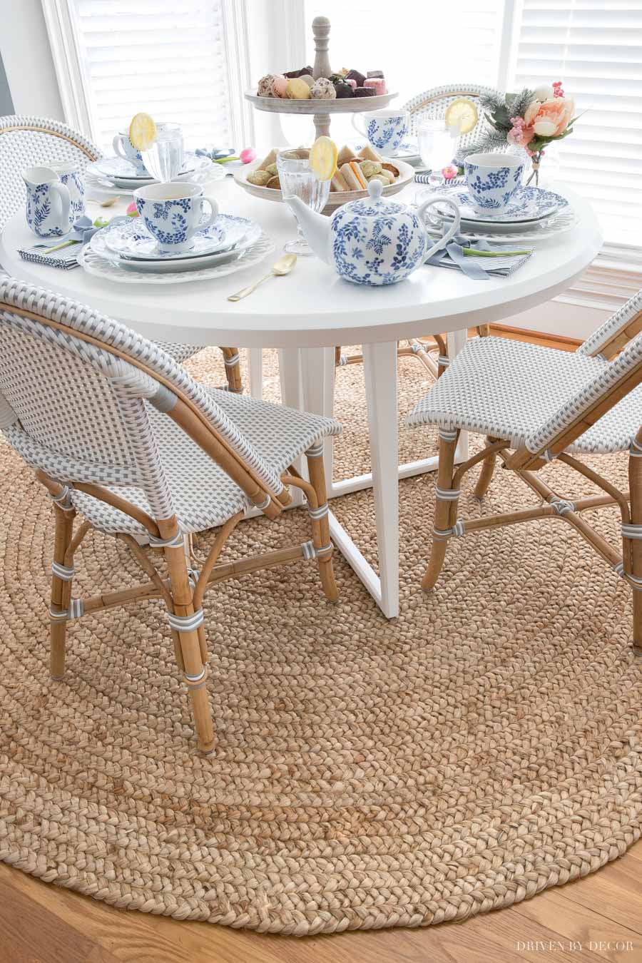 Breakfast nook with beautiful round braided jute rug