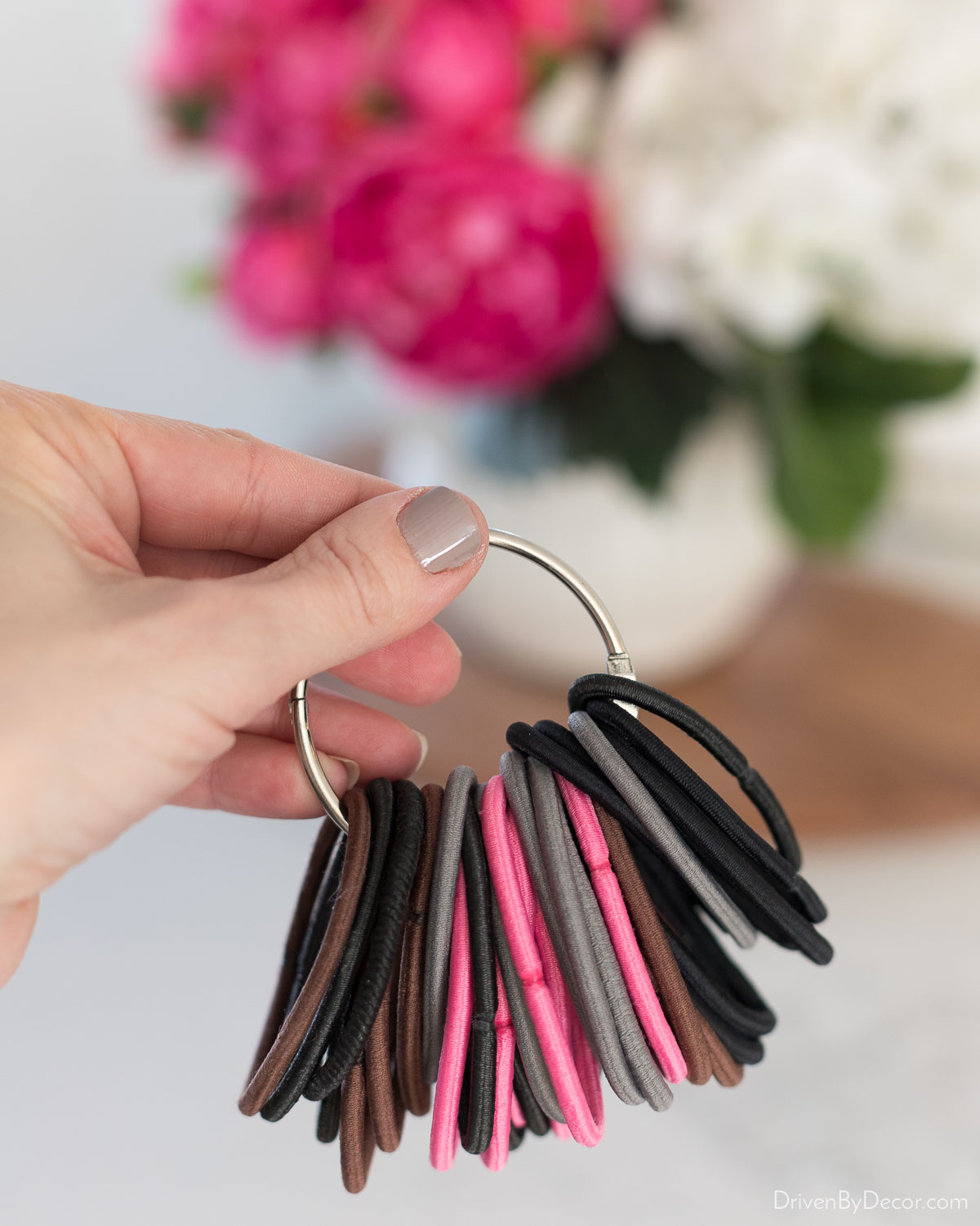 Hair bands on a simple binder clip (a favorite home organization idea)