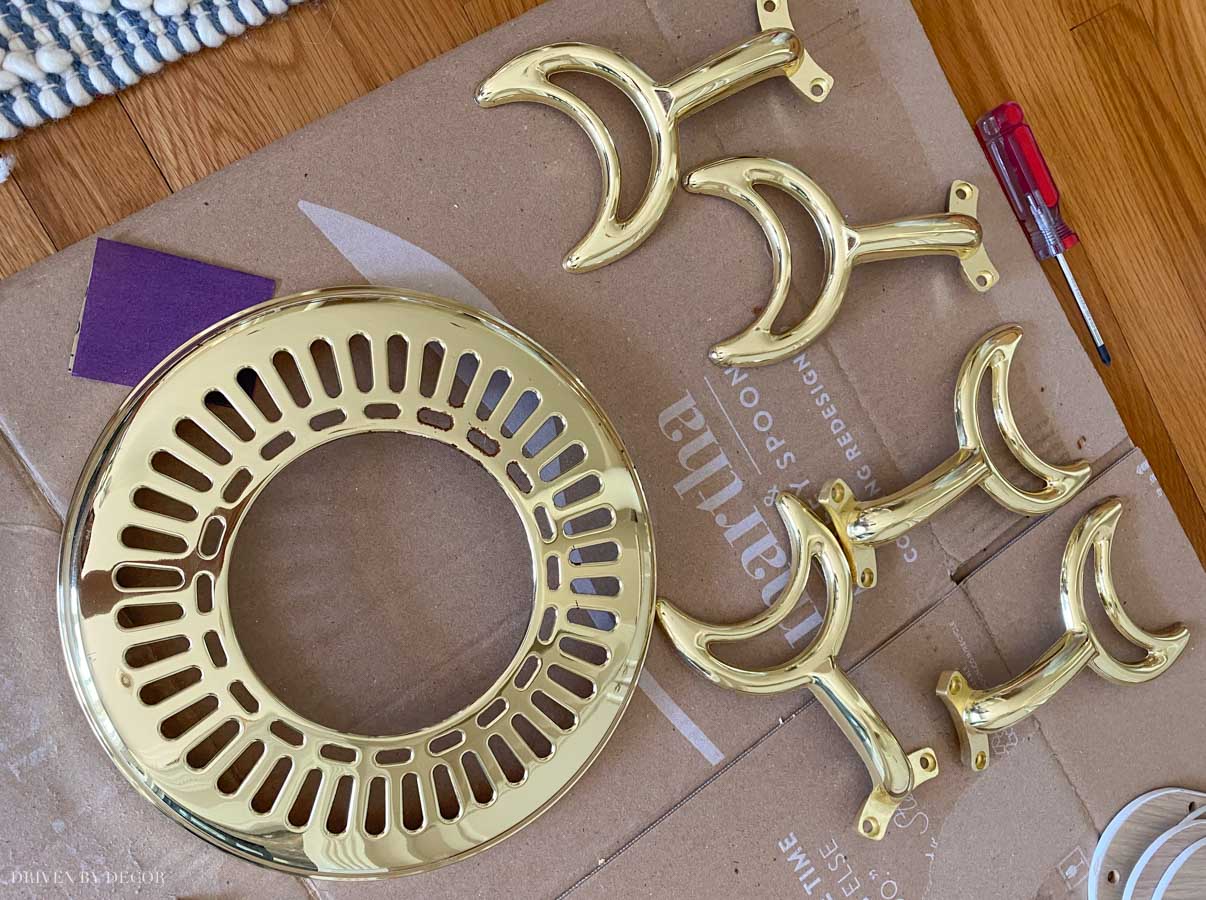 The brass ceiling fan parts that I spray painted white!