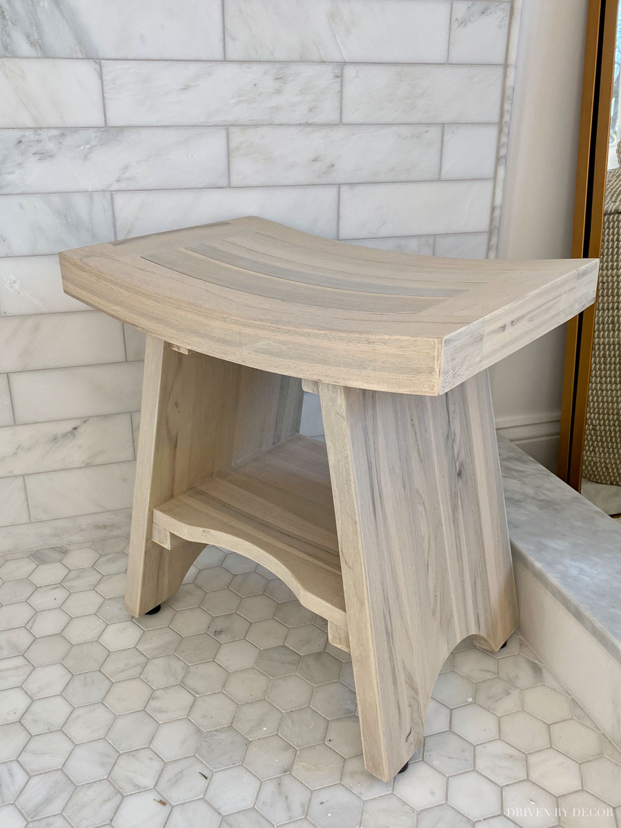 Perfect for a shower bench when you don't have a built-in bench! Lots of other pretty bathroom decor ideas in this post too!