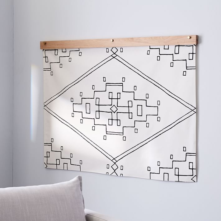 Love the the idea of a tapestry like this for living room wall decor!