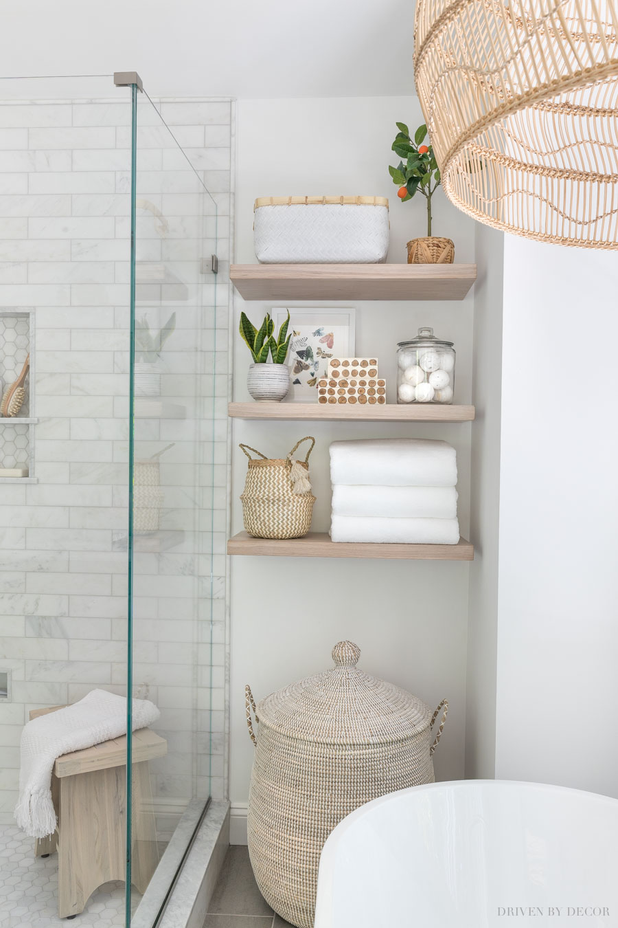 The floating wood shelves in our master bathroom!