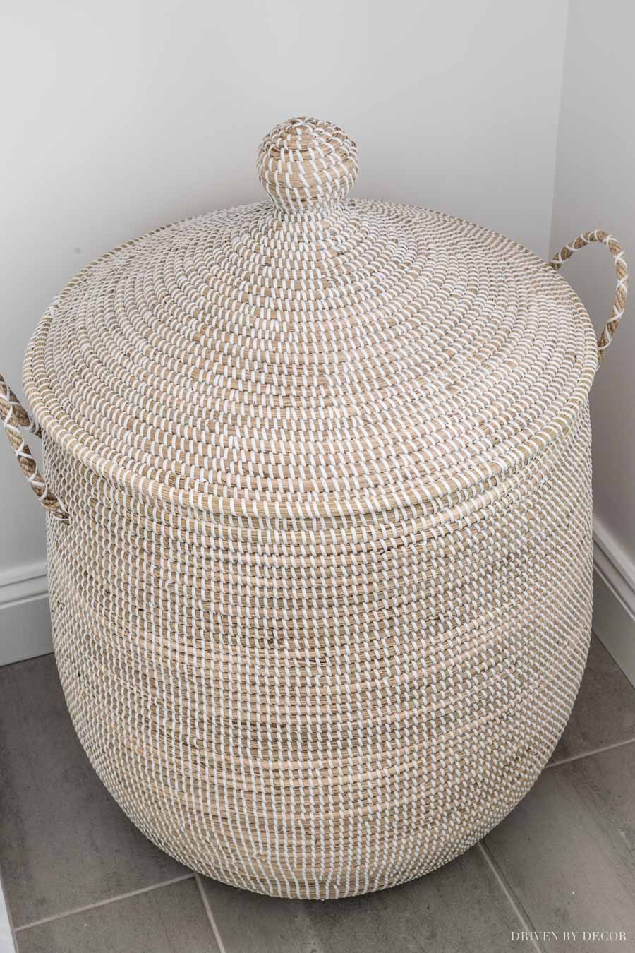 Our large woven seagrass hamper in our master bathroom