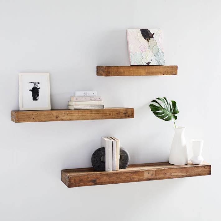 Reclaimed wood floating shelves that come in three length options