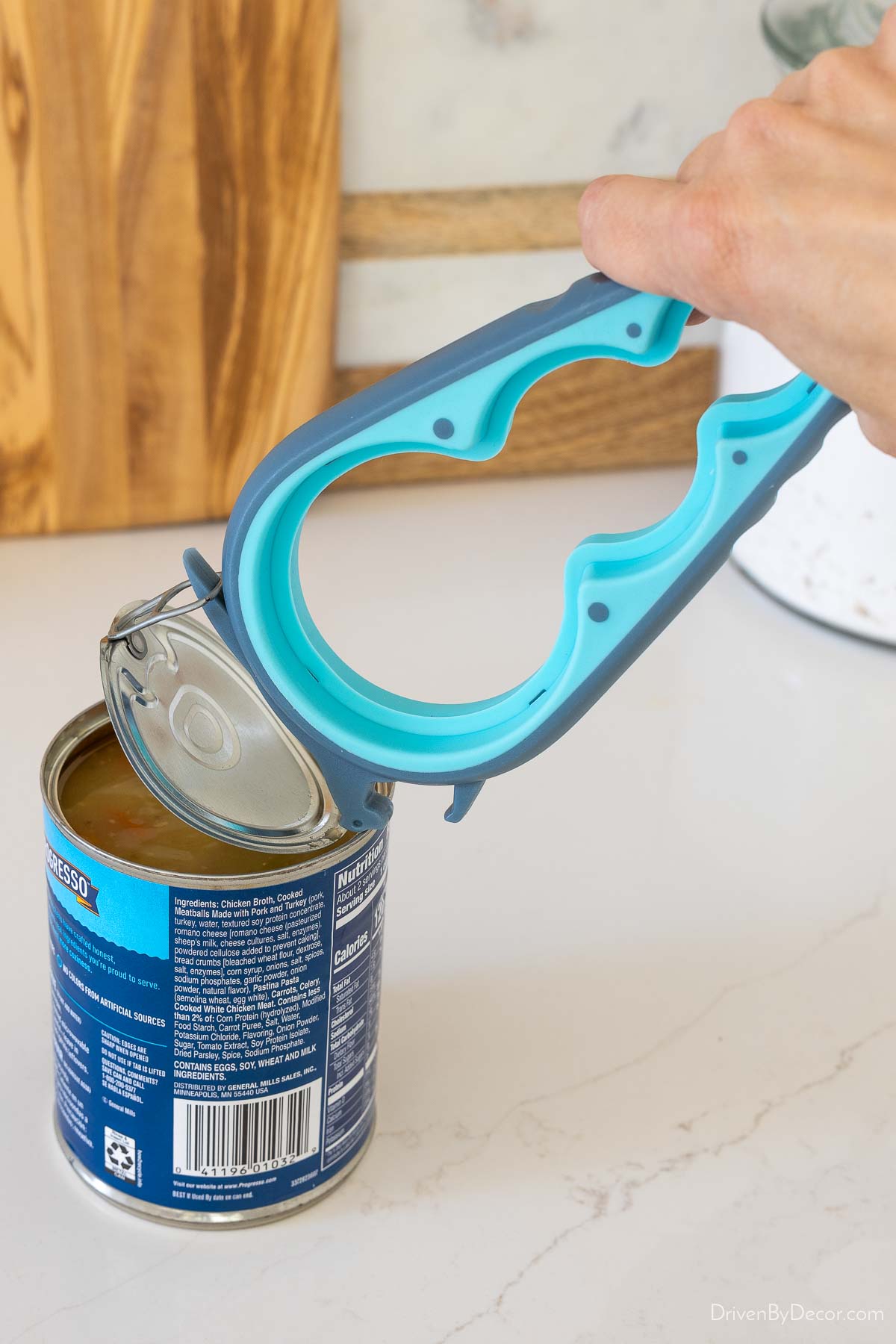 Kitchen gadget that opens jars and pull tab cans
