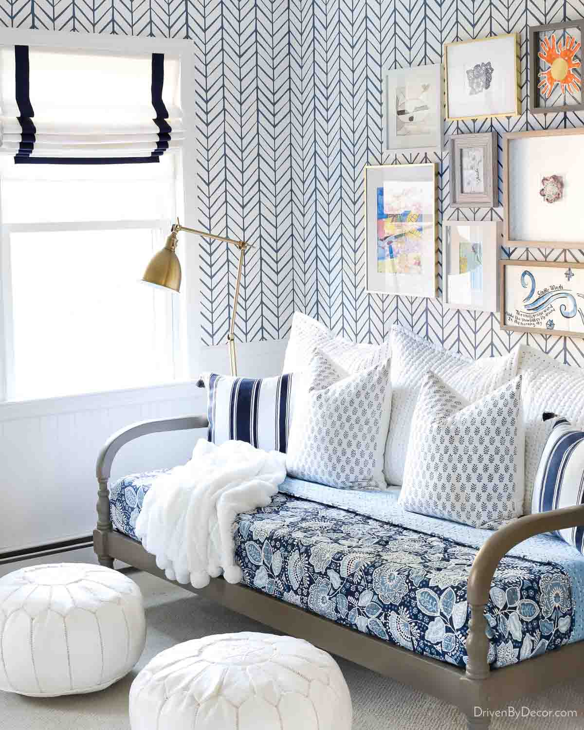 My 25 Best Etsy Home Decor Finds! White Roman shades with navy trim in room with daybed