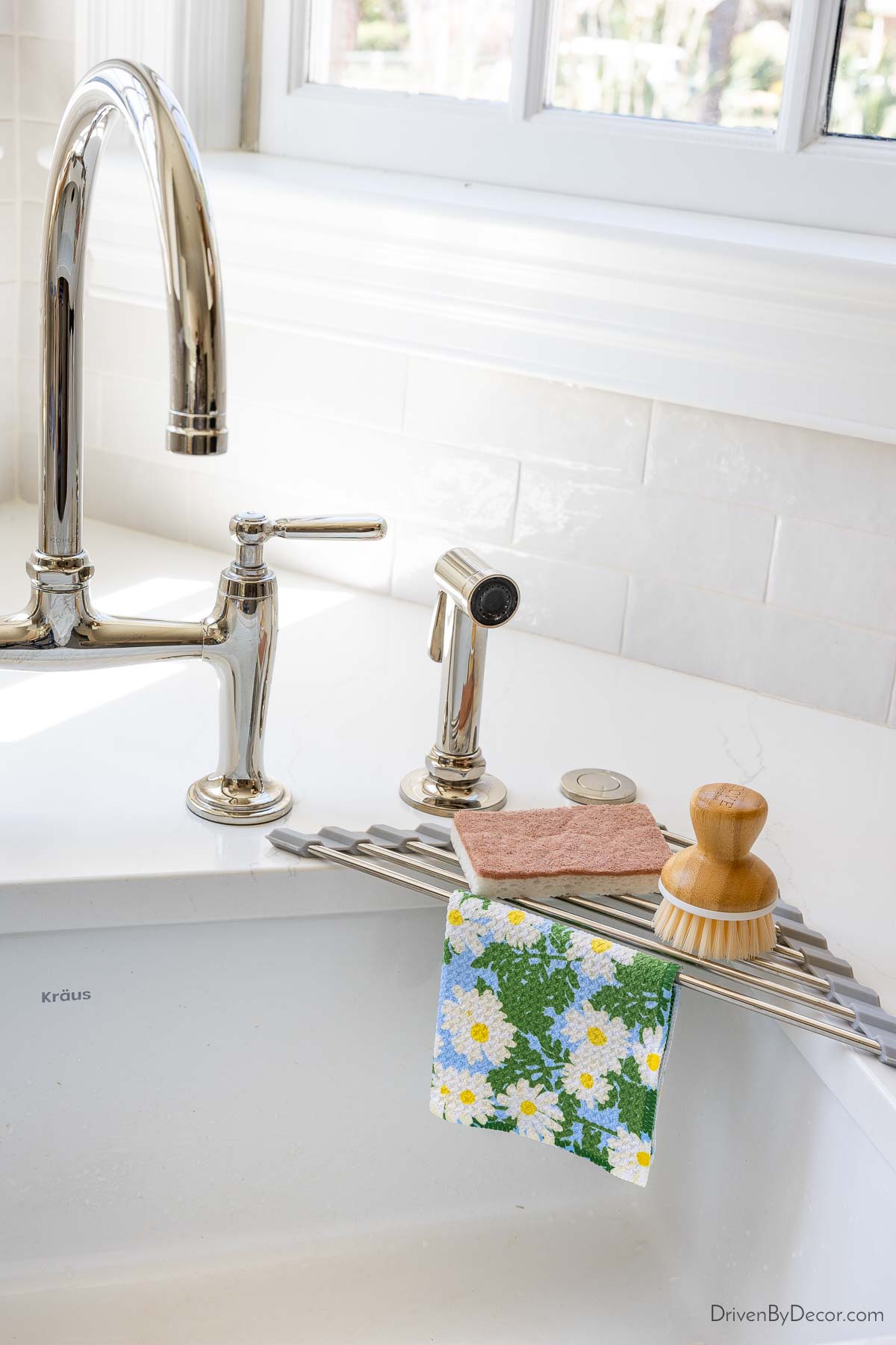 Corner drying rack holding sponge and dish rag
