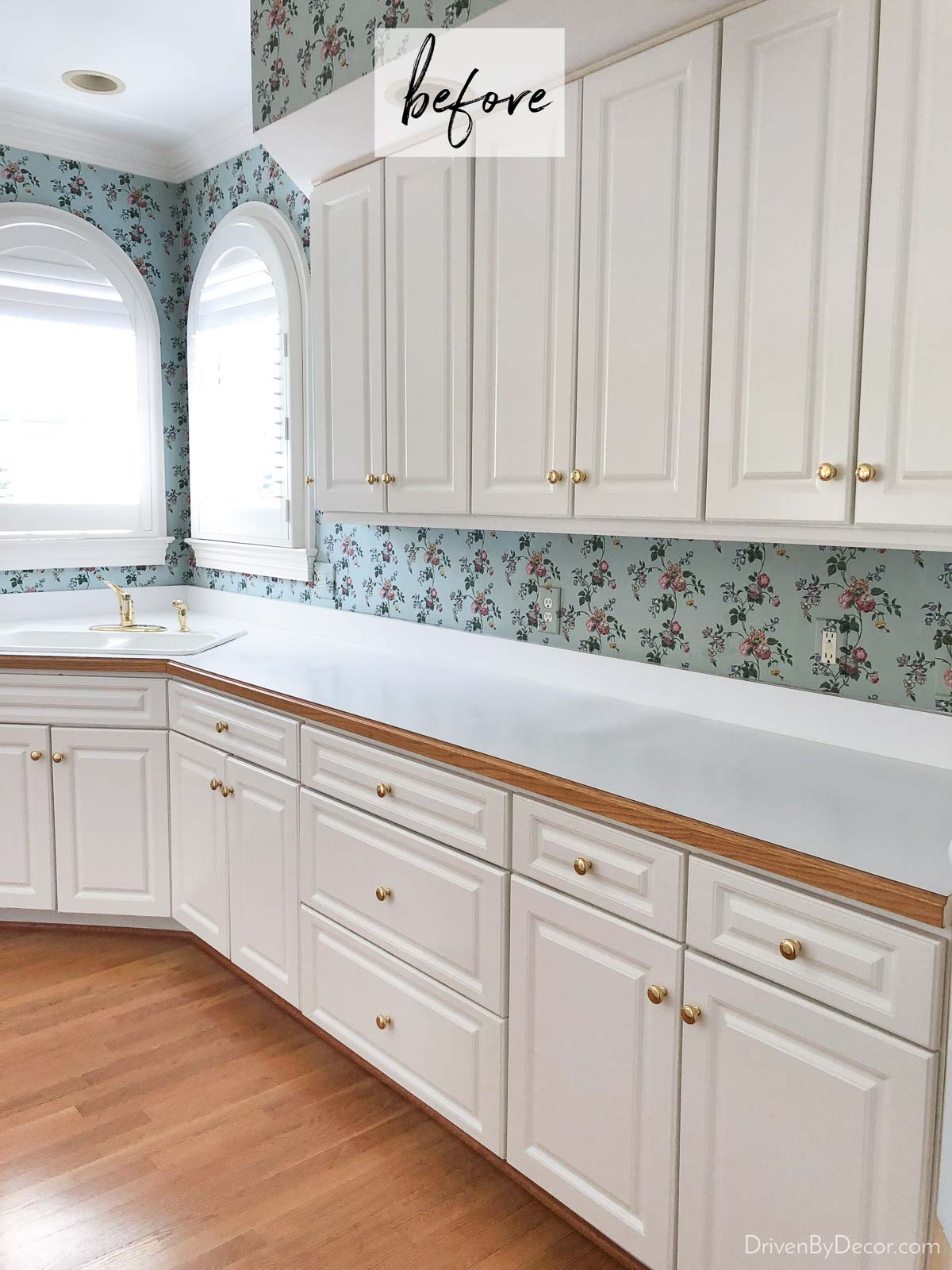 The wallpapered backsplash in our kitchen before