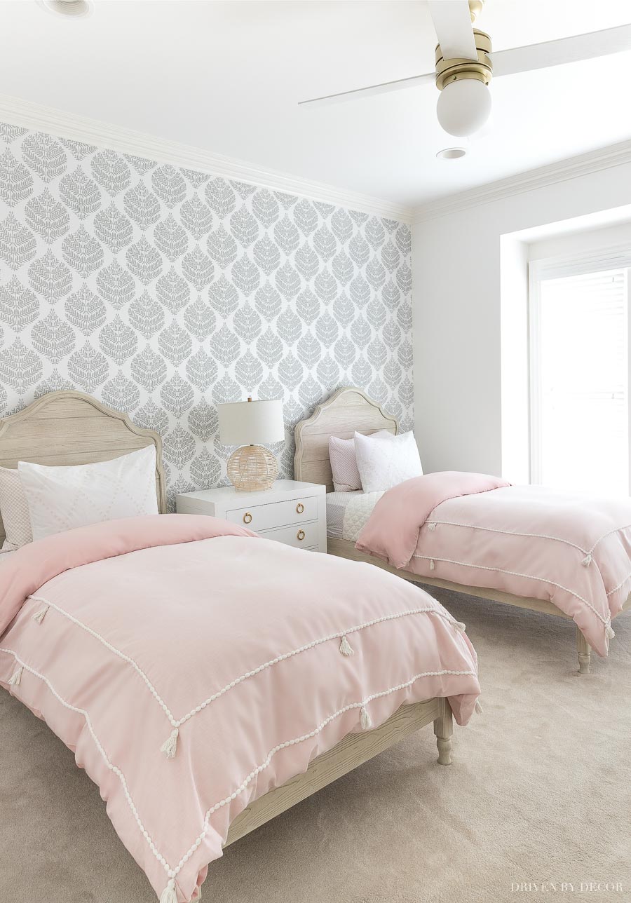 Love the peel and stick wallpaper she used in this bedroom!