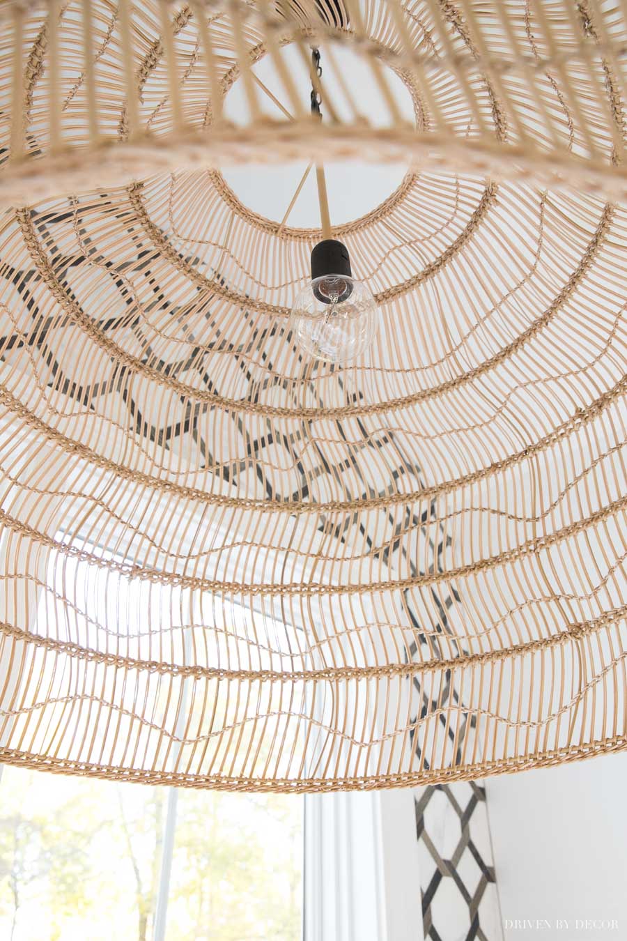 Gorgeous woven pendant with clear globe light bulb