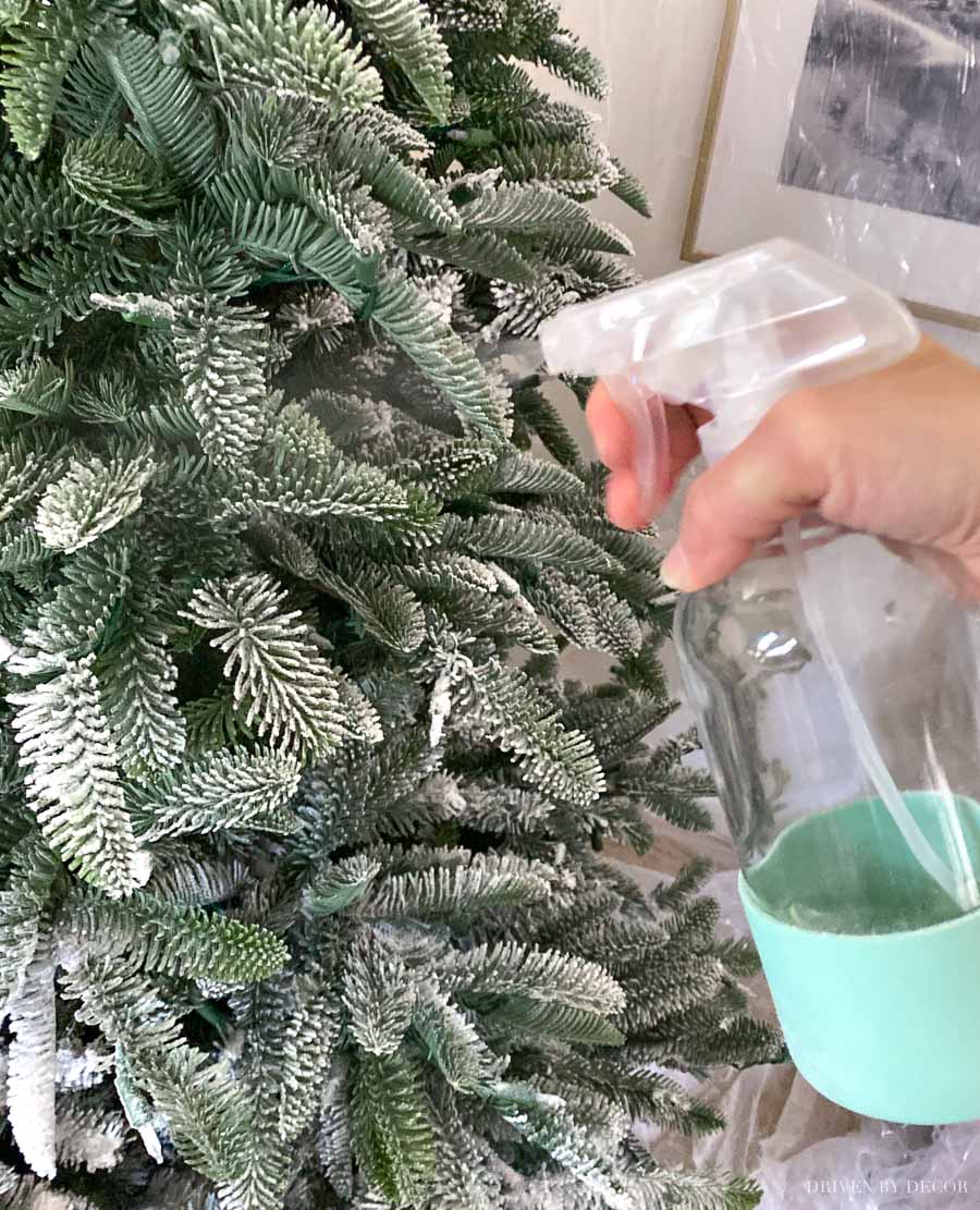 How to flock a Christmas tree - spraying to set the flocking powder is the last step!