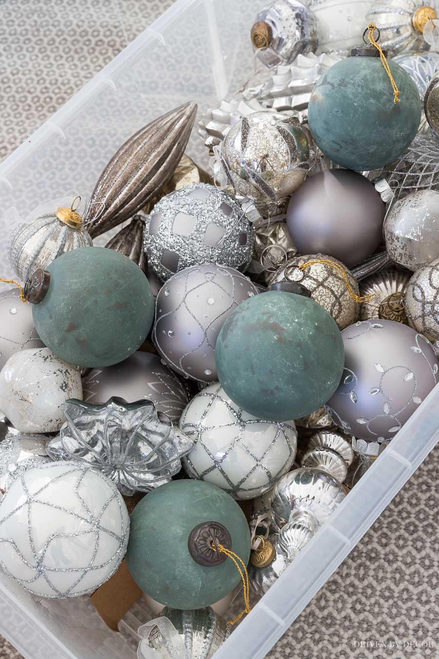 Love this mix of gold, silver, and green ornaments for decorating a Christmas tree!