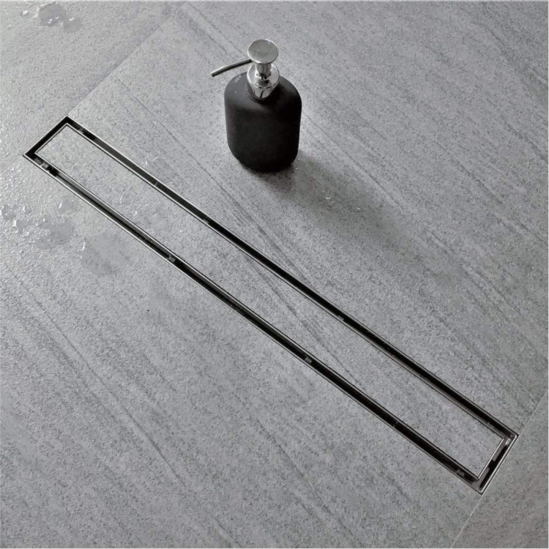 Linear shower drain that you can inset your shower tile into for a seamless look - love!