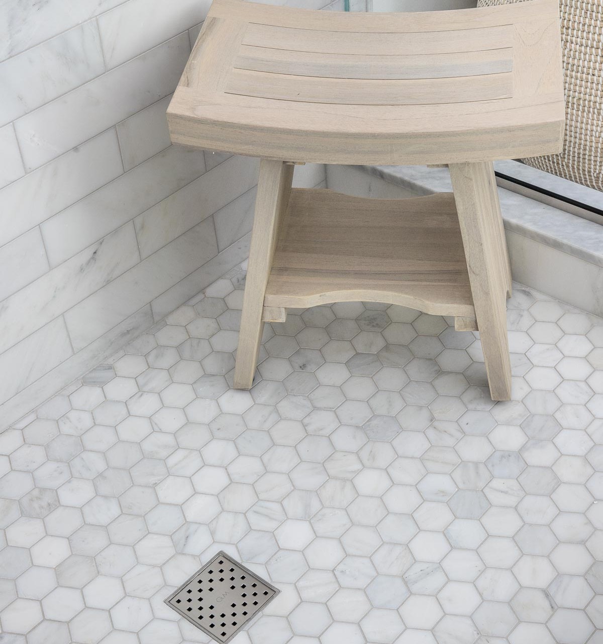Love the idea of a freestanding shower bench instead of a more expensive built-in one for a master bathroom remodel!