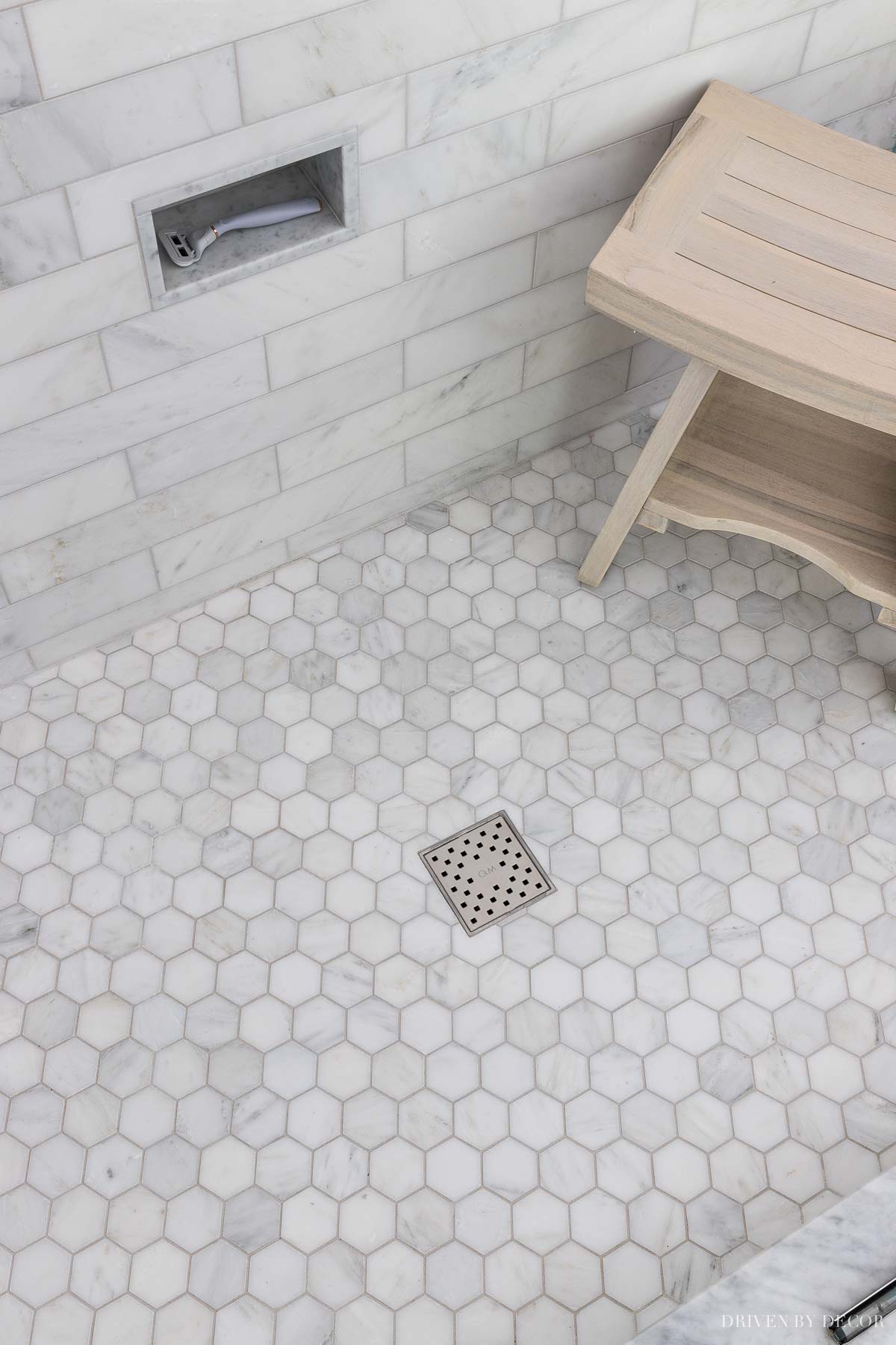 Such a simple master bathroom remodel idea - use a suare drain instead of a circular one!