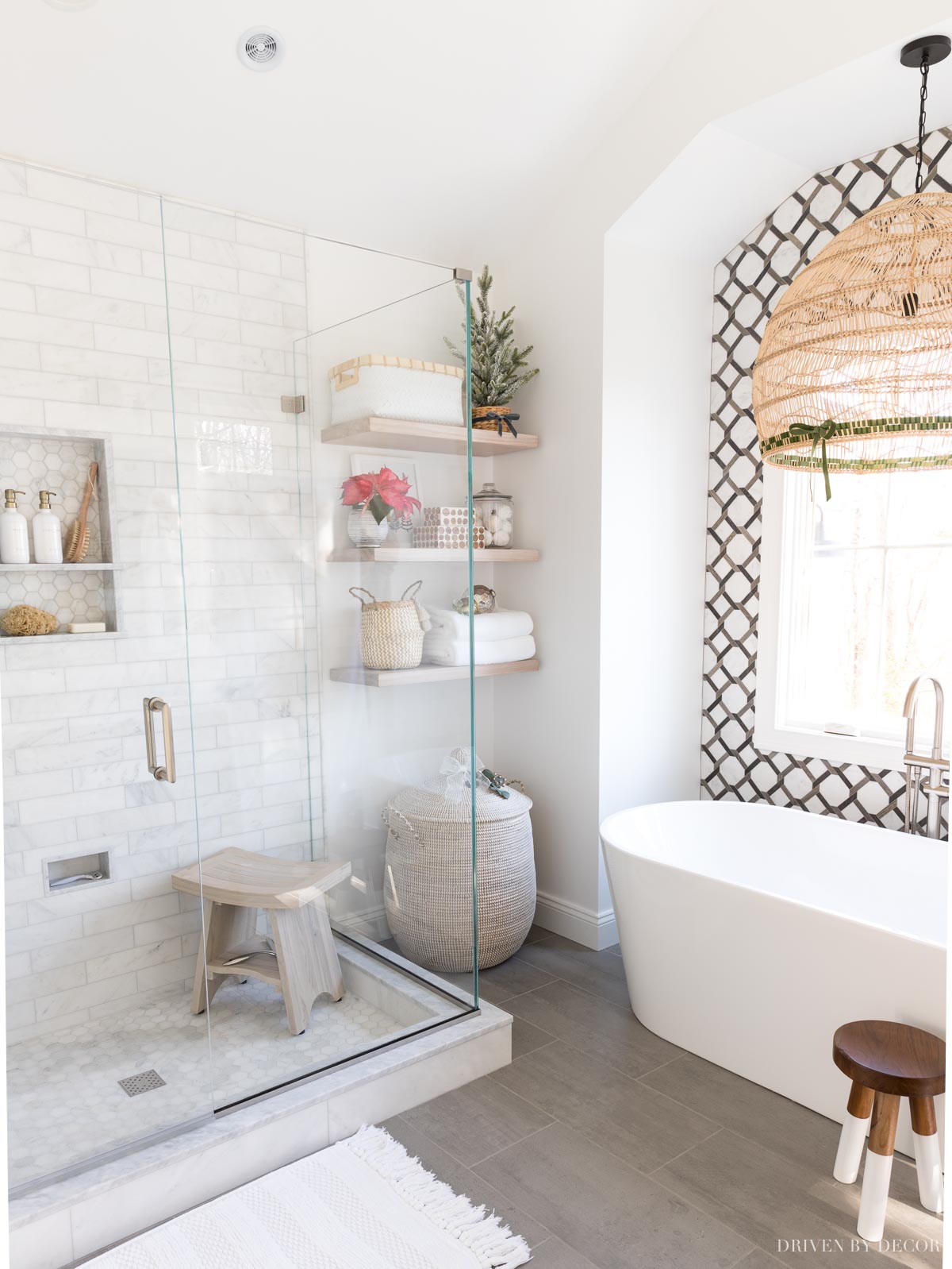 Love that gorgeous tile on the wall in this master bathroom! Great master bathroom remodel idea!