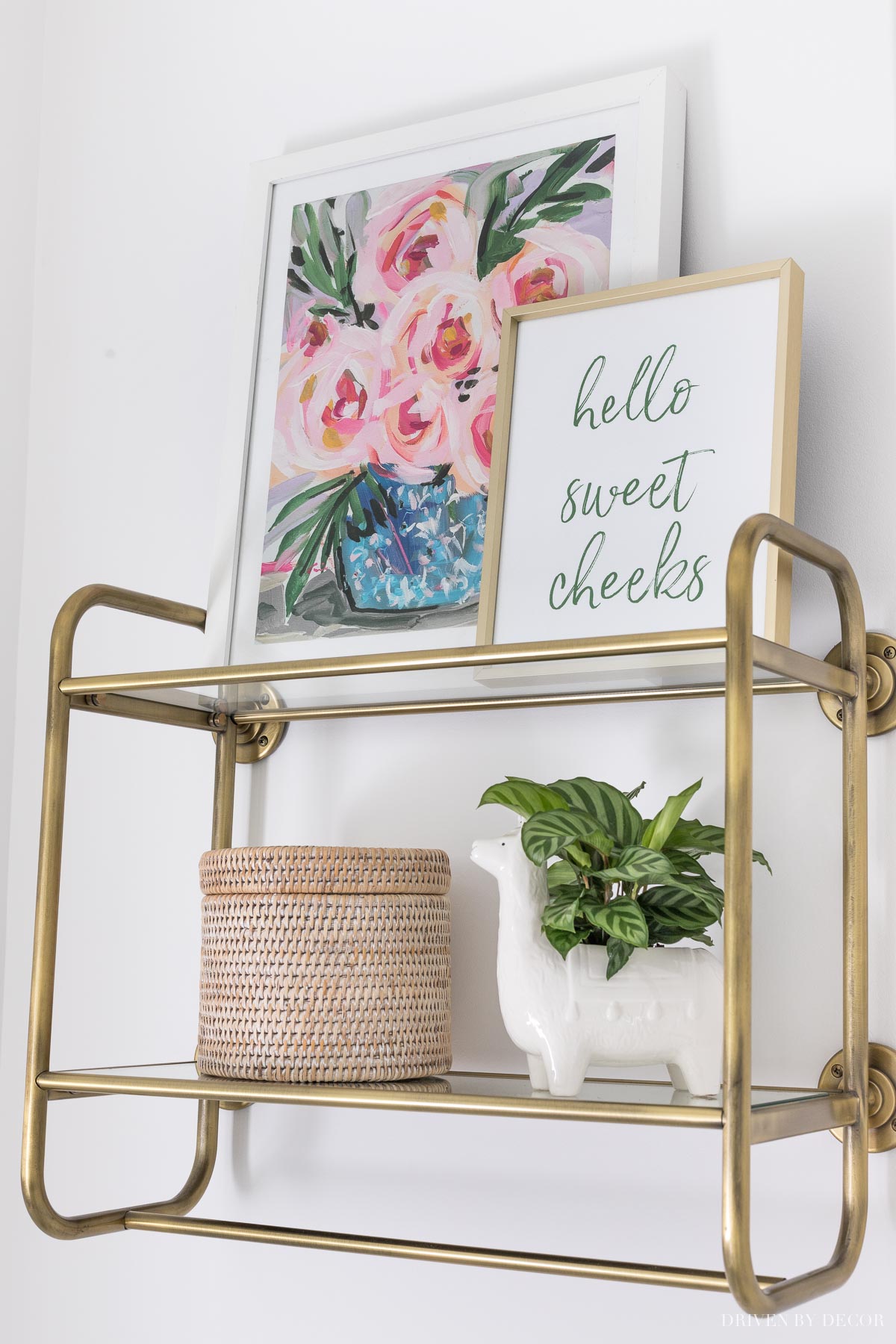 Love the idea of a wall shelf like this over the toilet in the master bathroom!