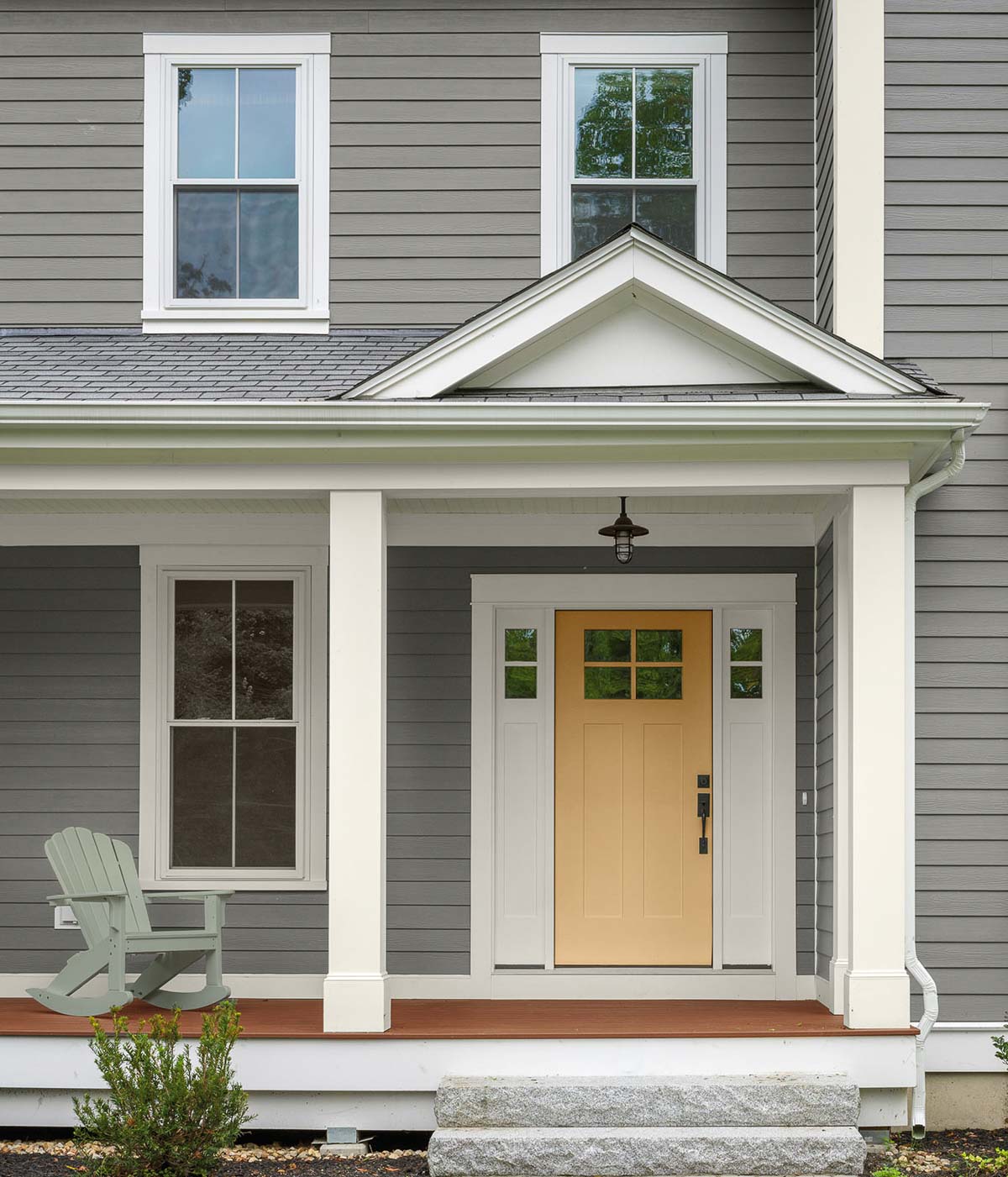 Several of Behr's paint colors of the year are on this home - love the siding and door colors!