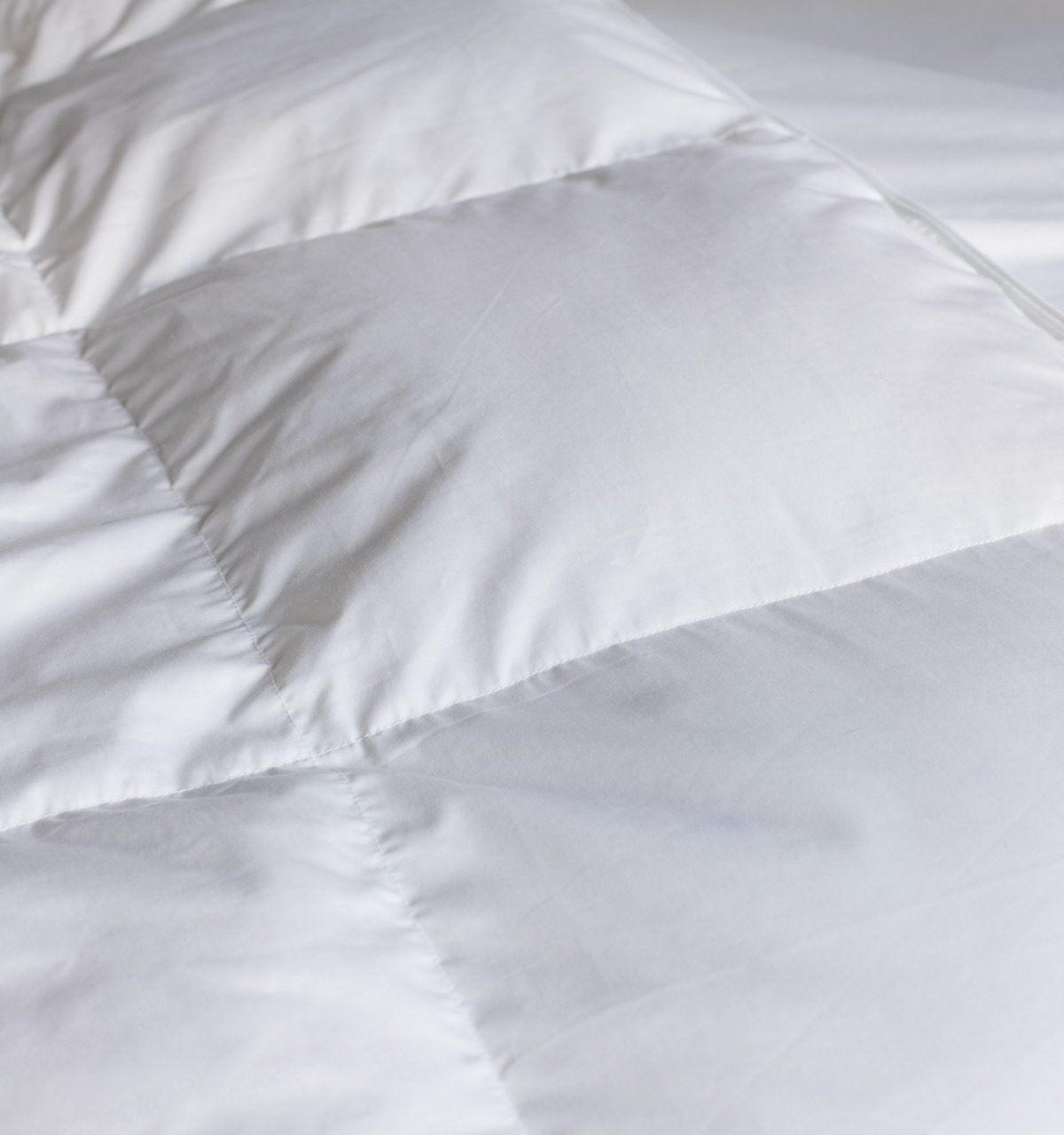 Look for duvet inserts with baffle box construction like this one for more loft and fluffiness! 