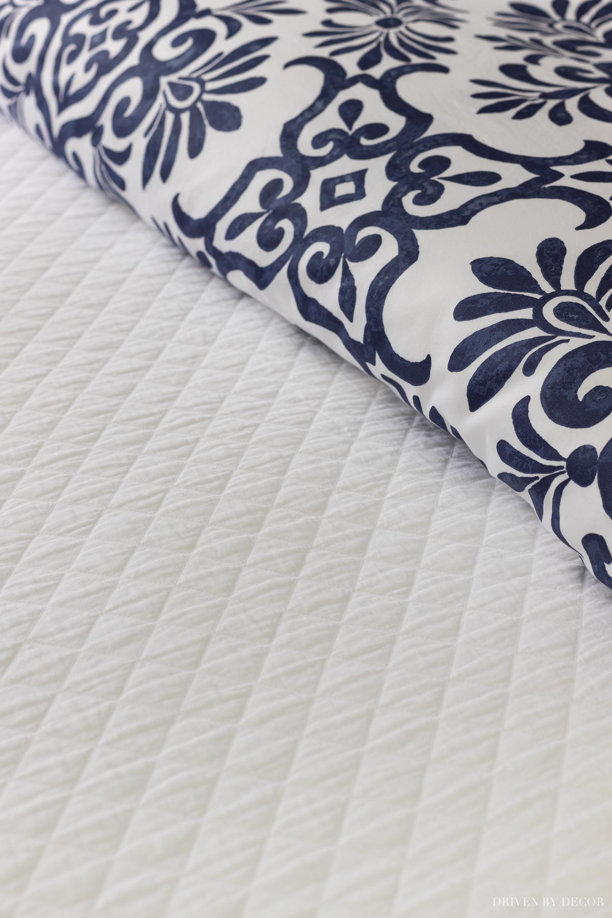 Love this white coverlet - one of my favorite bedding essentials!