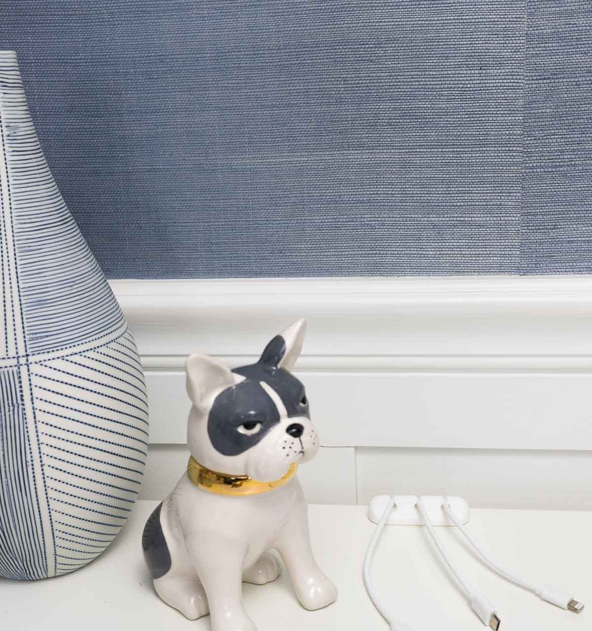 So smart! This little cord holder strip holds your cords so they don't fall behind your desk! One of the desk organization ideas in this post!