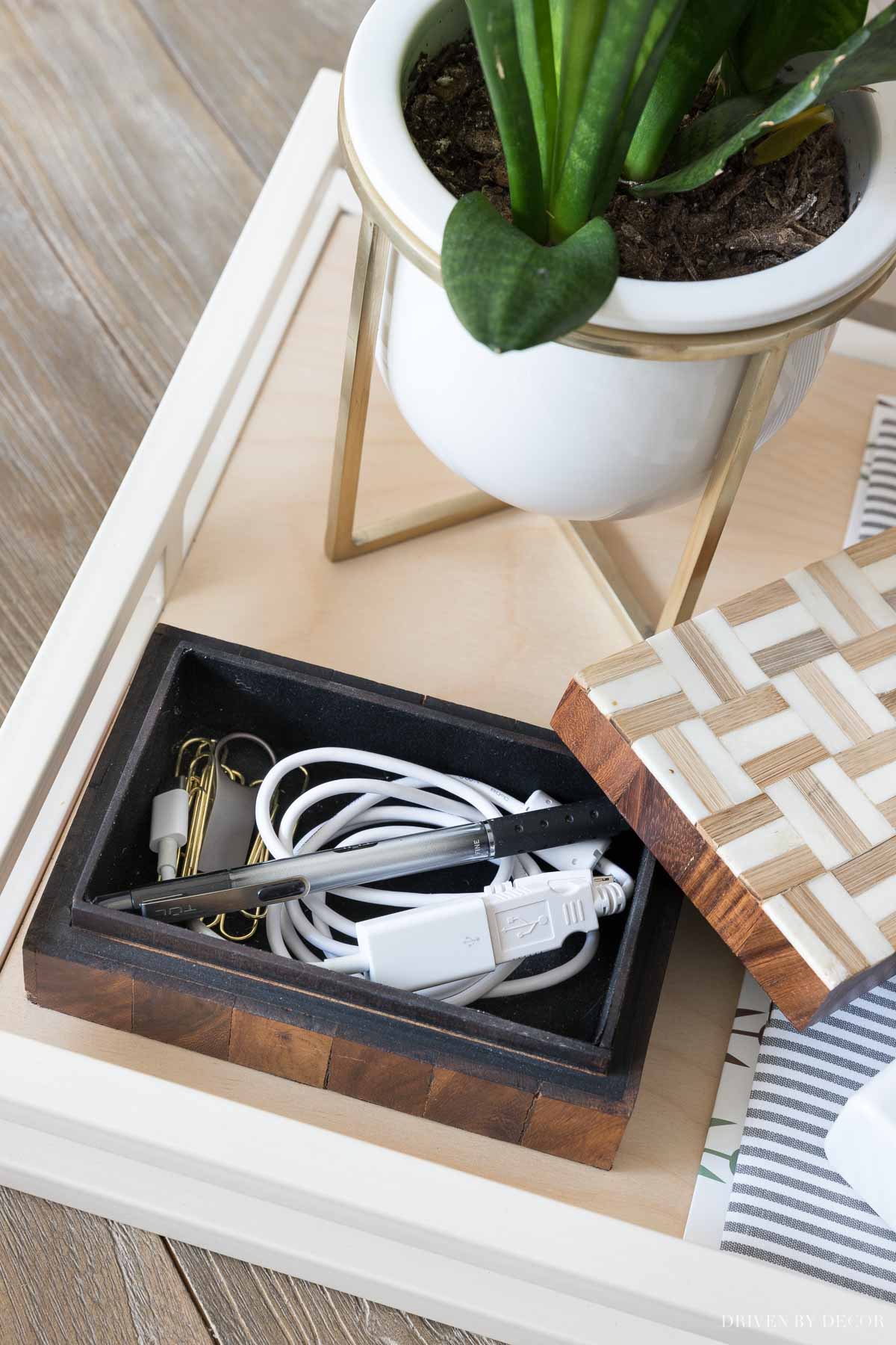 An idea for keeping your desk organized and neat - have a small decorative box for your computer cords, pen, paperclips, and other most-used office supplies