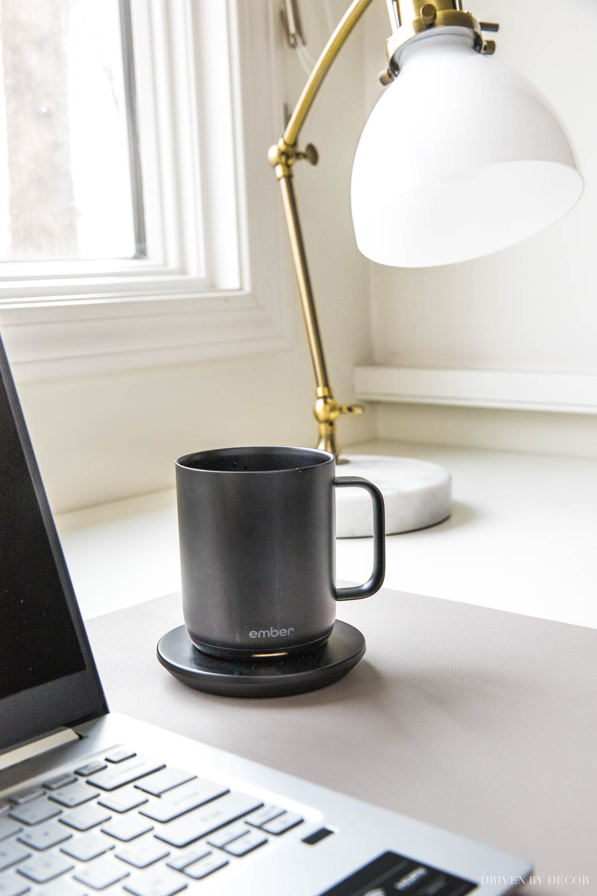 One of my favorite Amazon gadgets - a smart mug that keeps your coffee hot on AND off the heating plate!