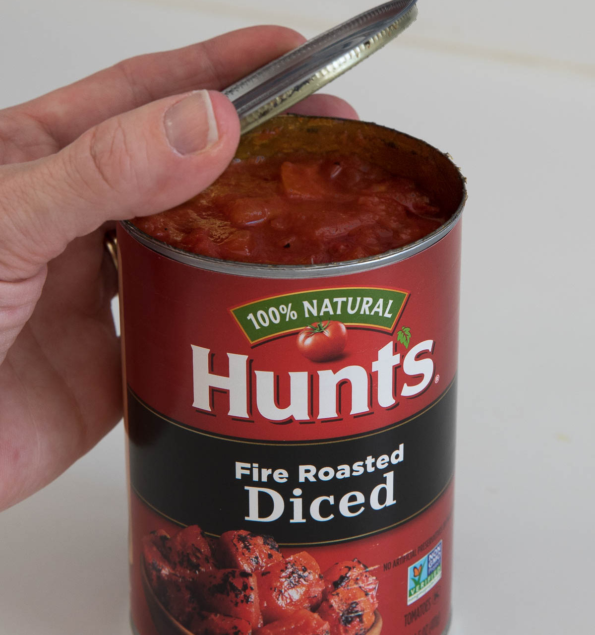 Love how this can opener cuts under the edge of the lid so you can place it back on top in the fridge!
