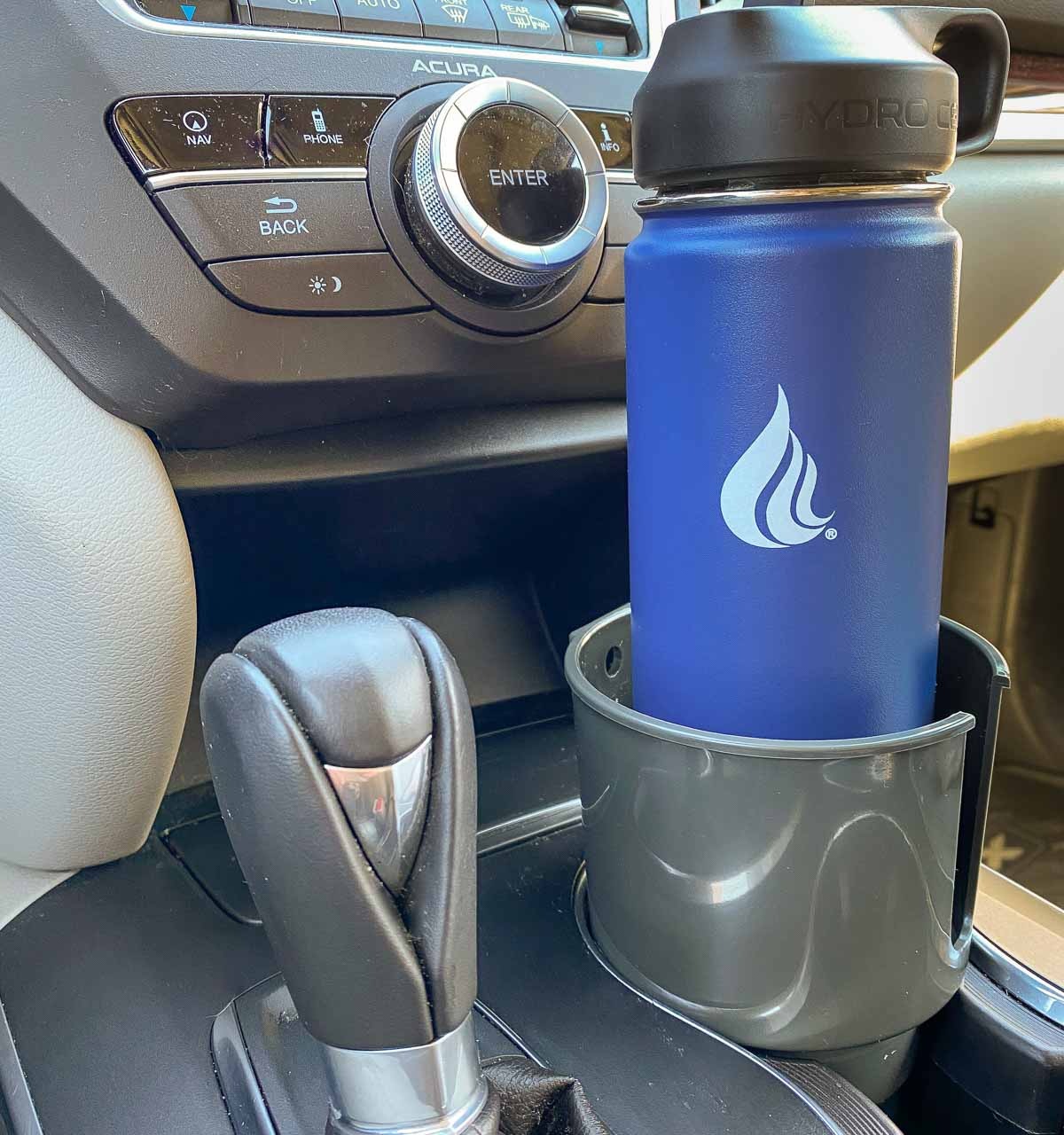 Love this car cup holder that fits large water bottles and mugs with handles too!