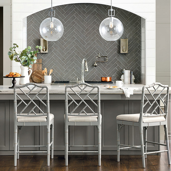 Love the gorgeous Chippendale design on the chair backs of these counter stools!