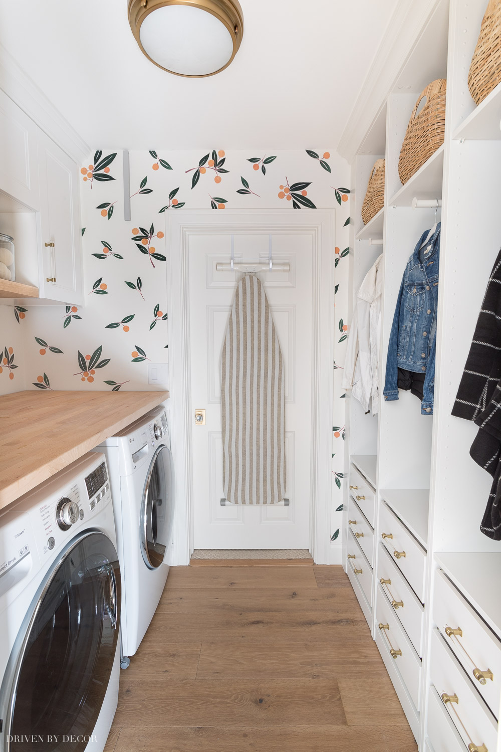 We transformed the look of our laundry room with Ikea cabinets and wardrobes! 